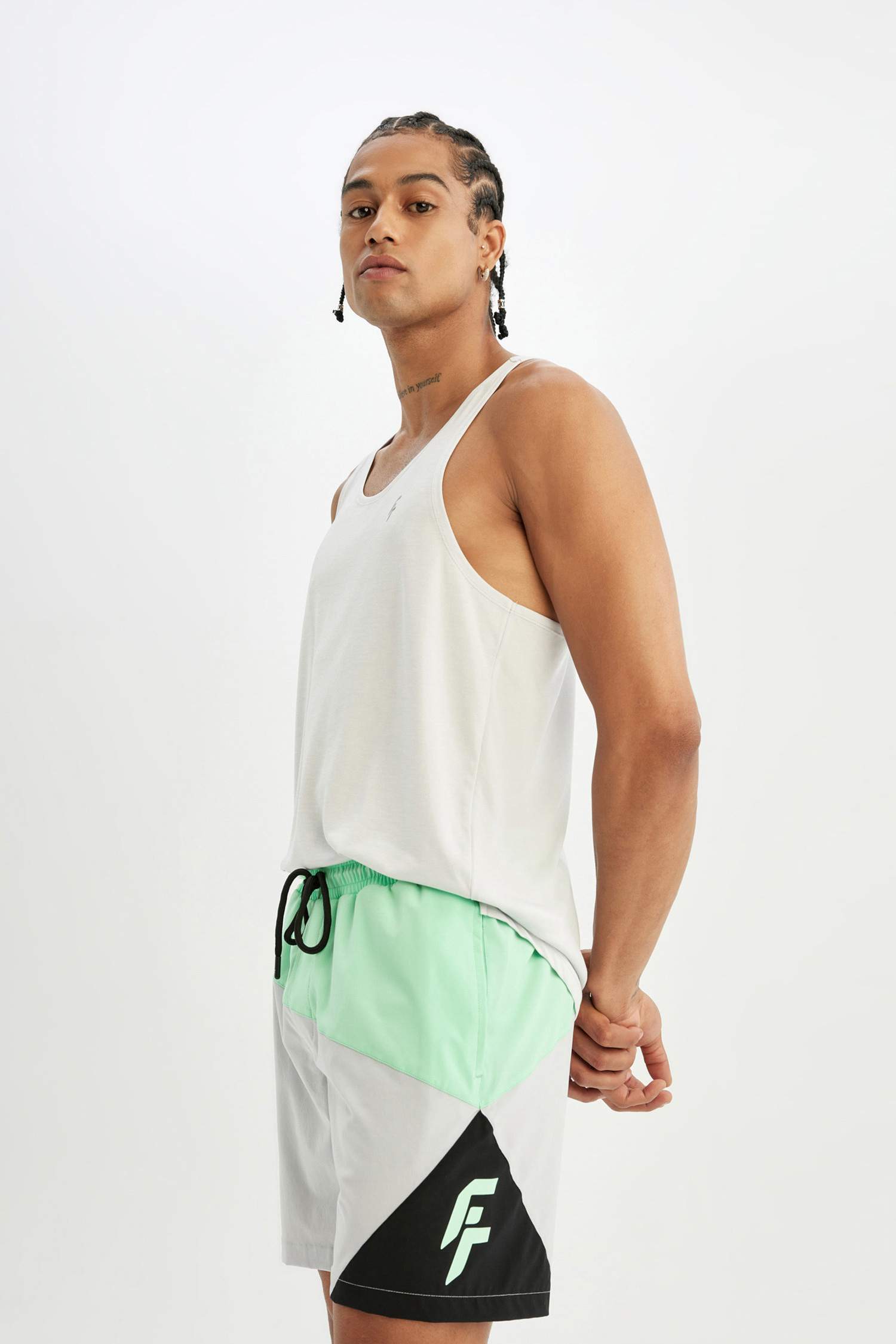 شورت بحر قصير قصة عادية ملون محكم من DeFactoFit