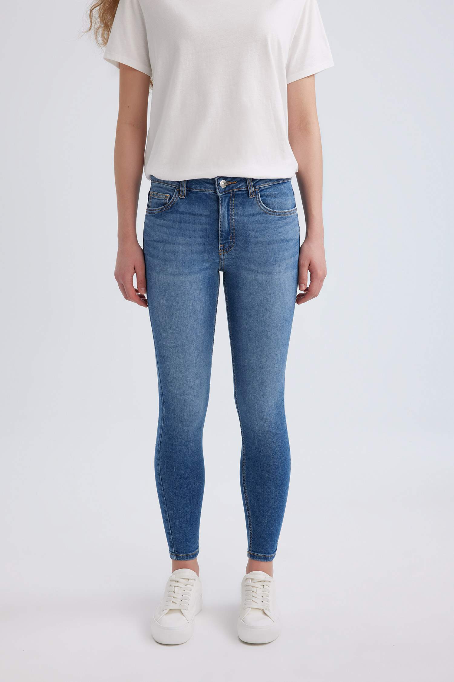 بنطرون جينز سكيني فيت بخصر عادي