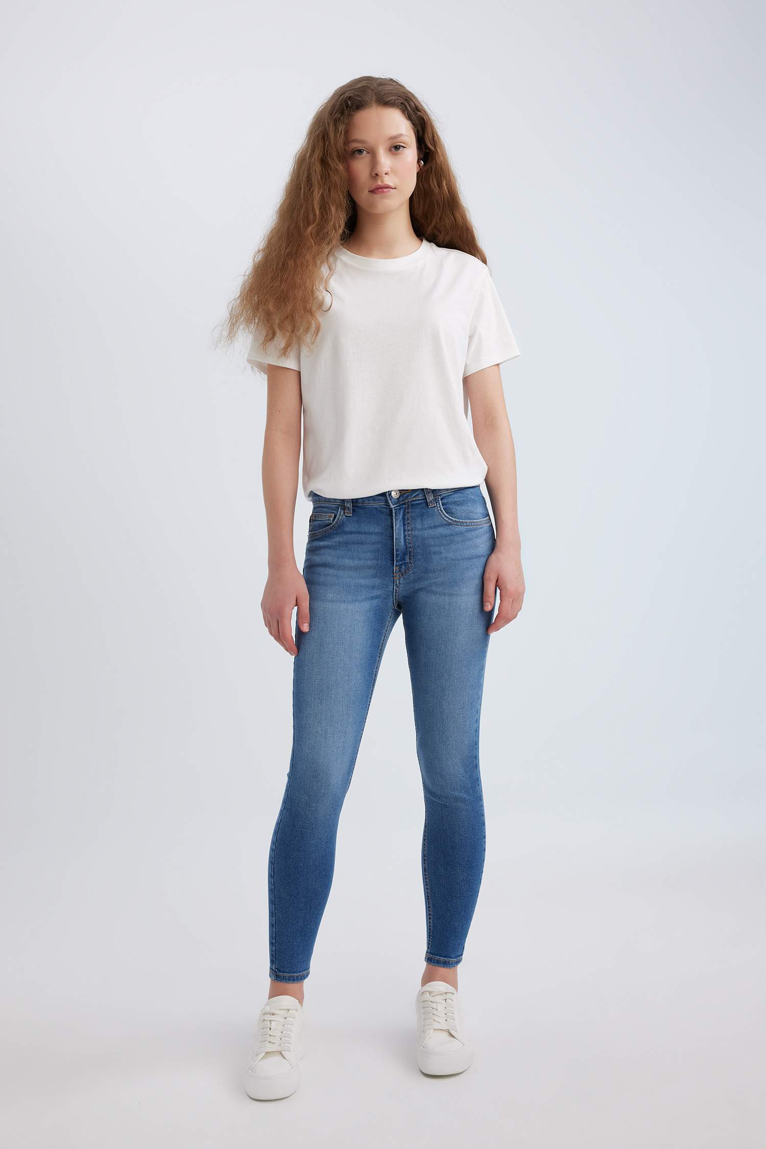 بنطرون جينز سكيني فيت بخصر عادي