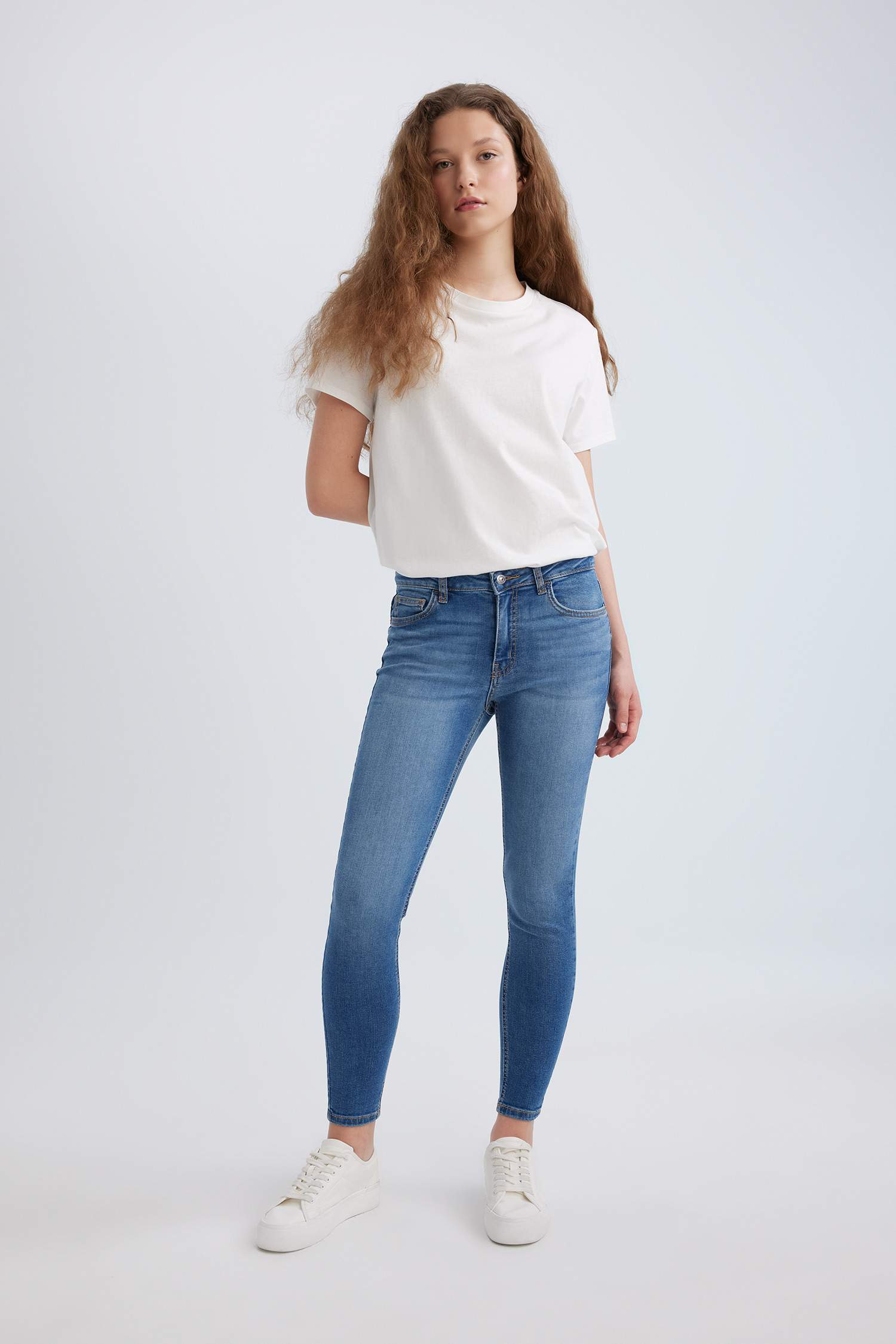 بنطرون جينز سكيني فيت بخصر عادي