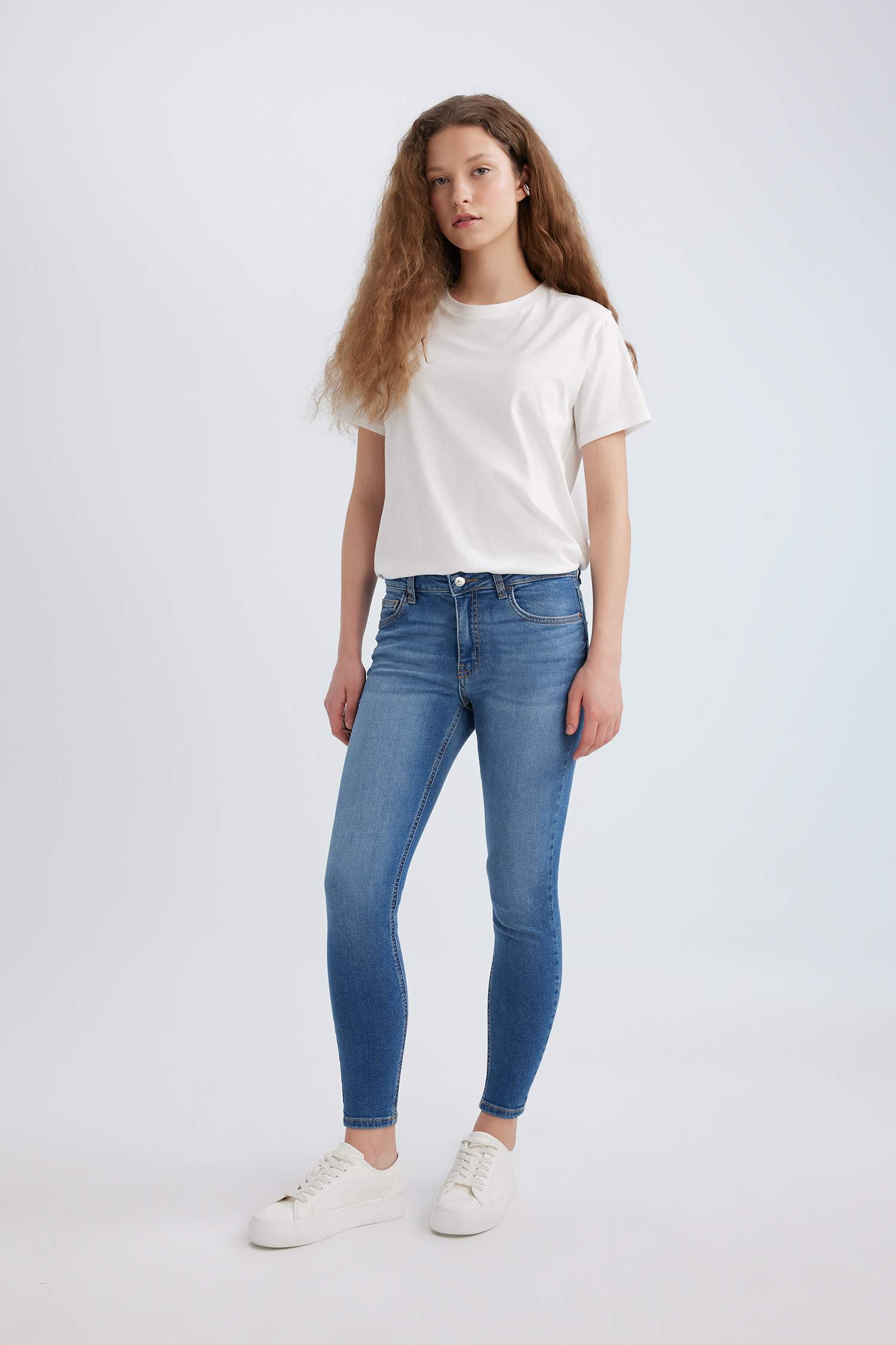 بنطرون جينز سكيني فيت بخصر عادي