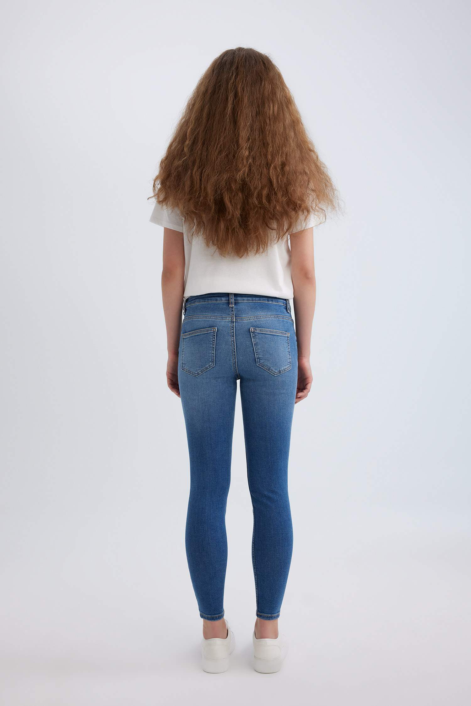 بنطرون جينز سكيني فيت بخصر عادي