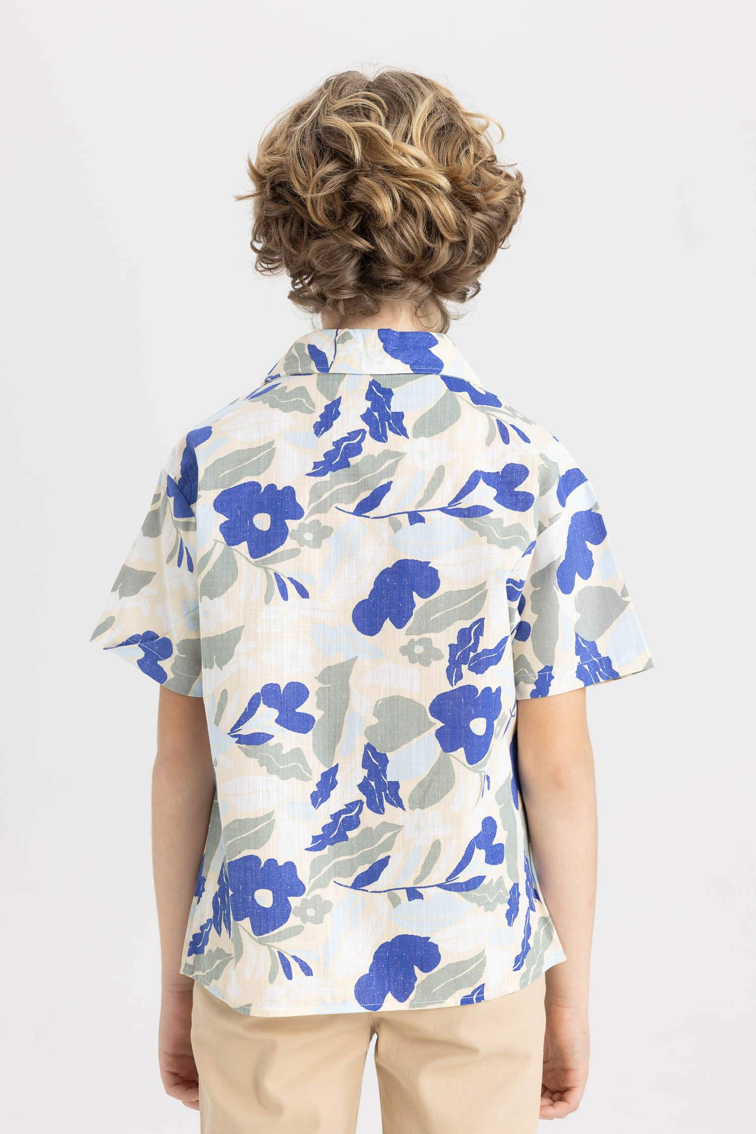 قميص بولو اولادي نص كم اوفر سايز فيسكوز