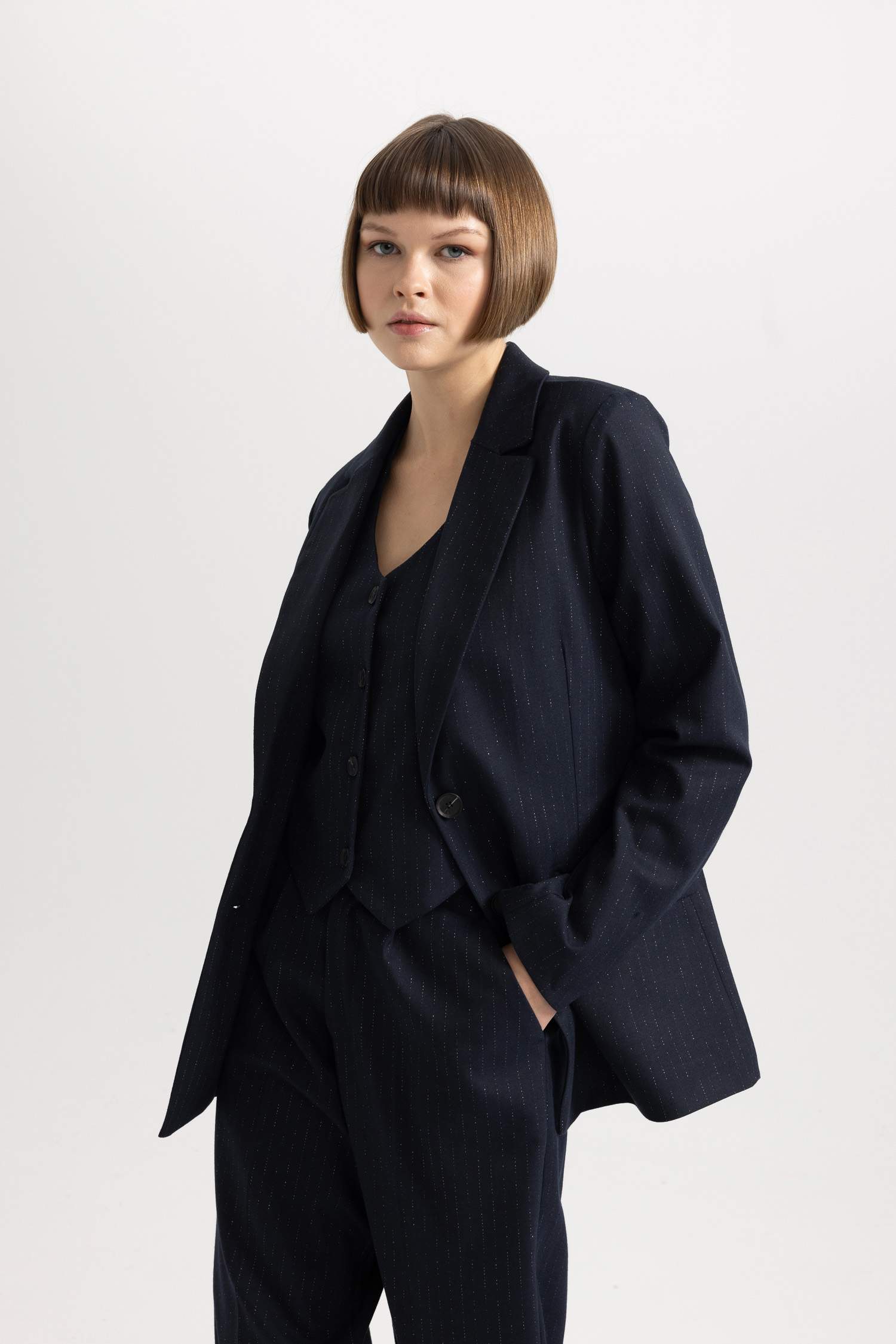 سترة بليزر مخطط قصة فضفاضة