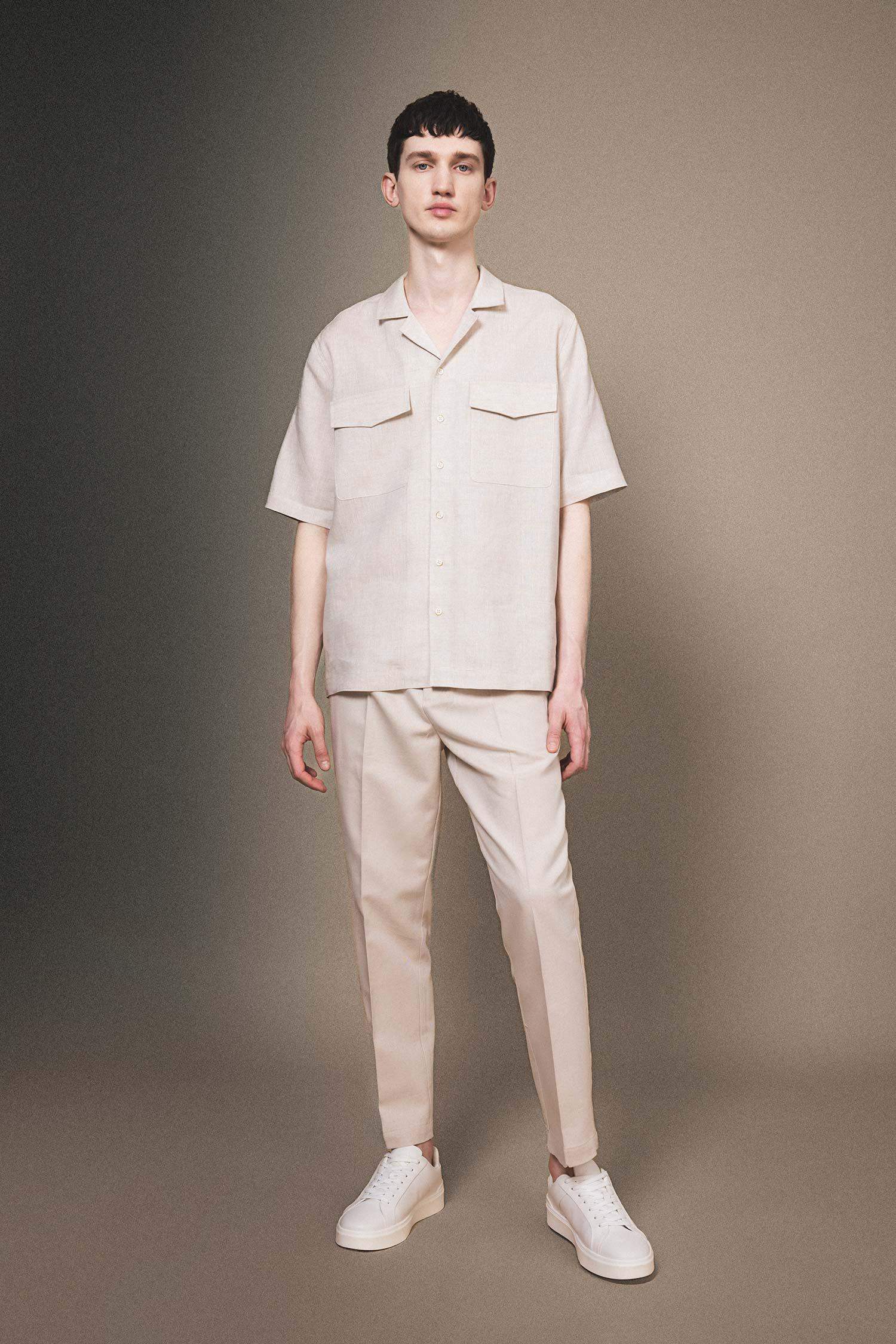 قميص بولو كتان بيج نص كم قصة مريحة