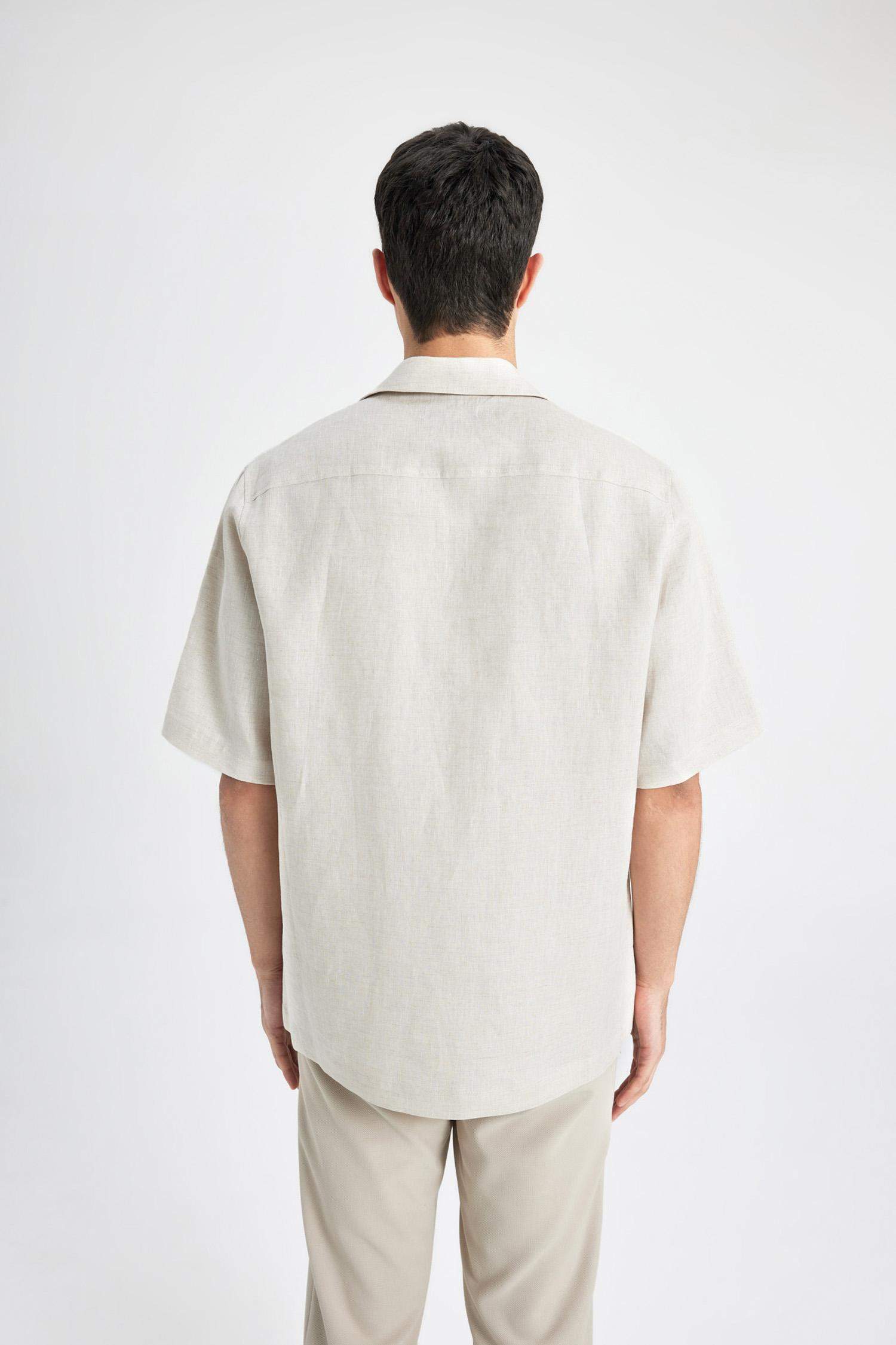 قميص بولو كتان بيج نص كم قصة مريحة