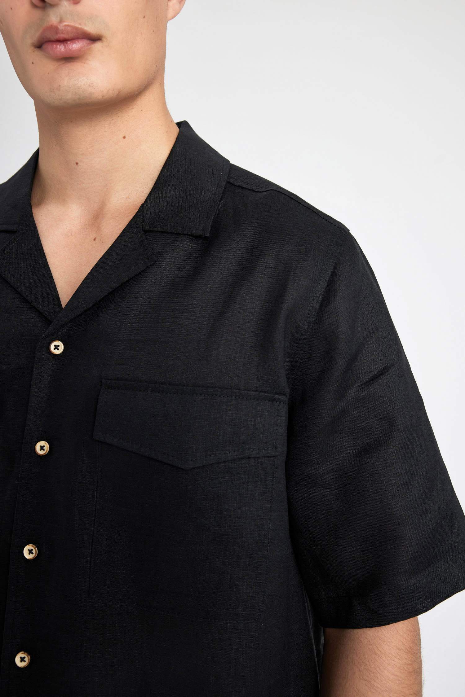 قميص بولو اسود كتان نص كم قصة مريحة