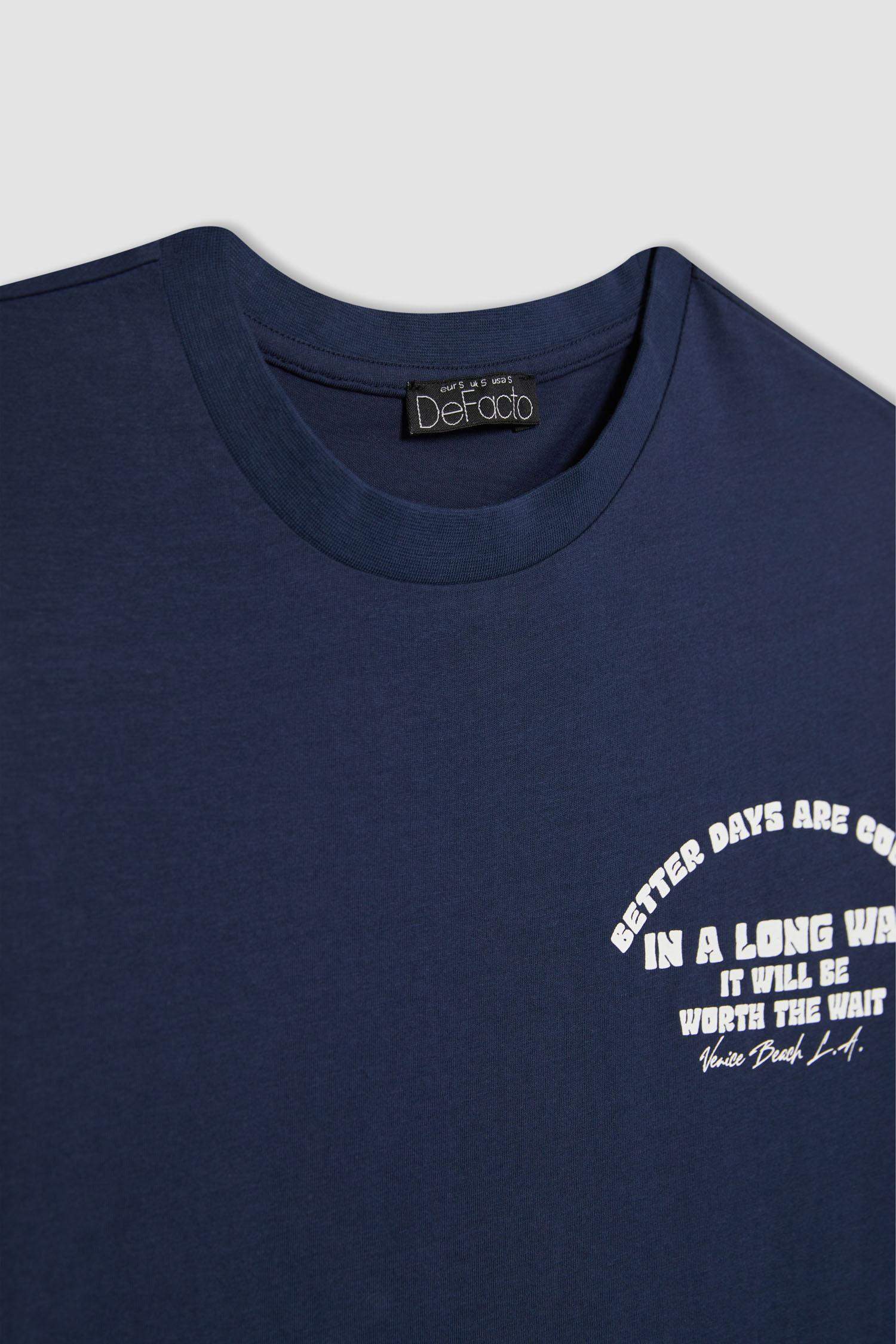 تيشيرت نص كم قصة فضفاضة برقبة مستديرة