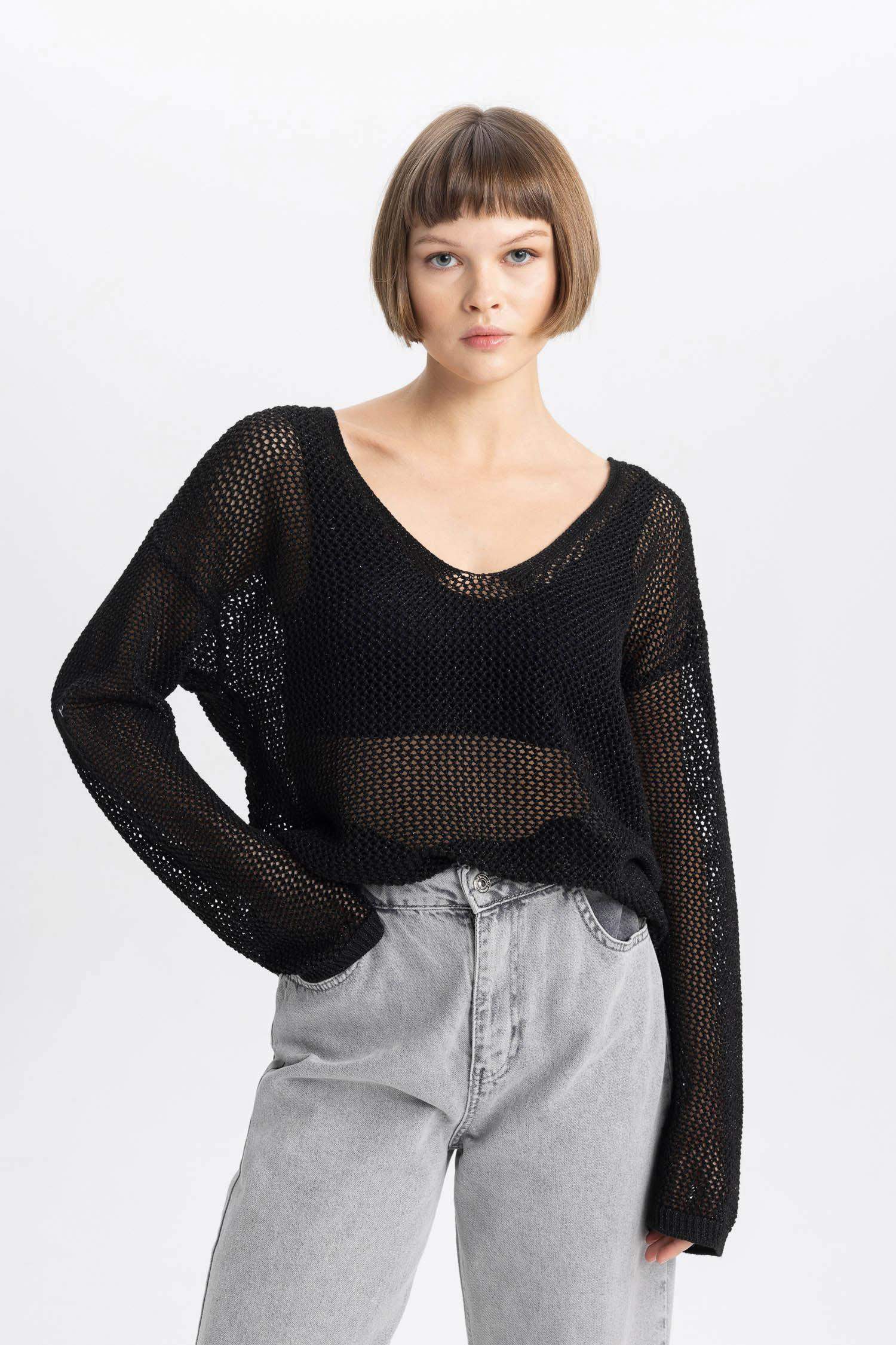 بلوفر تريكو قماش لامع قصة مريحة بياقة قارب