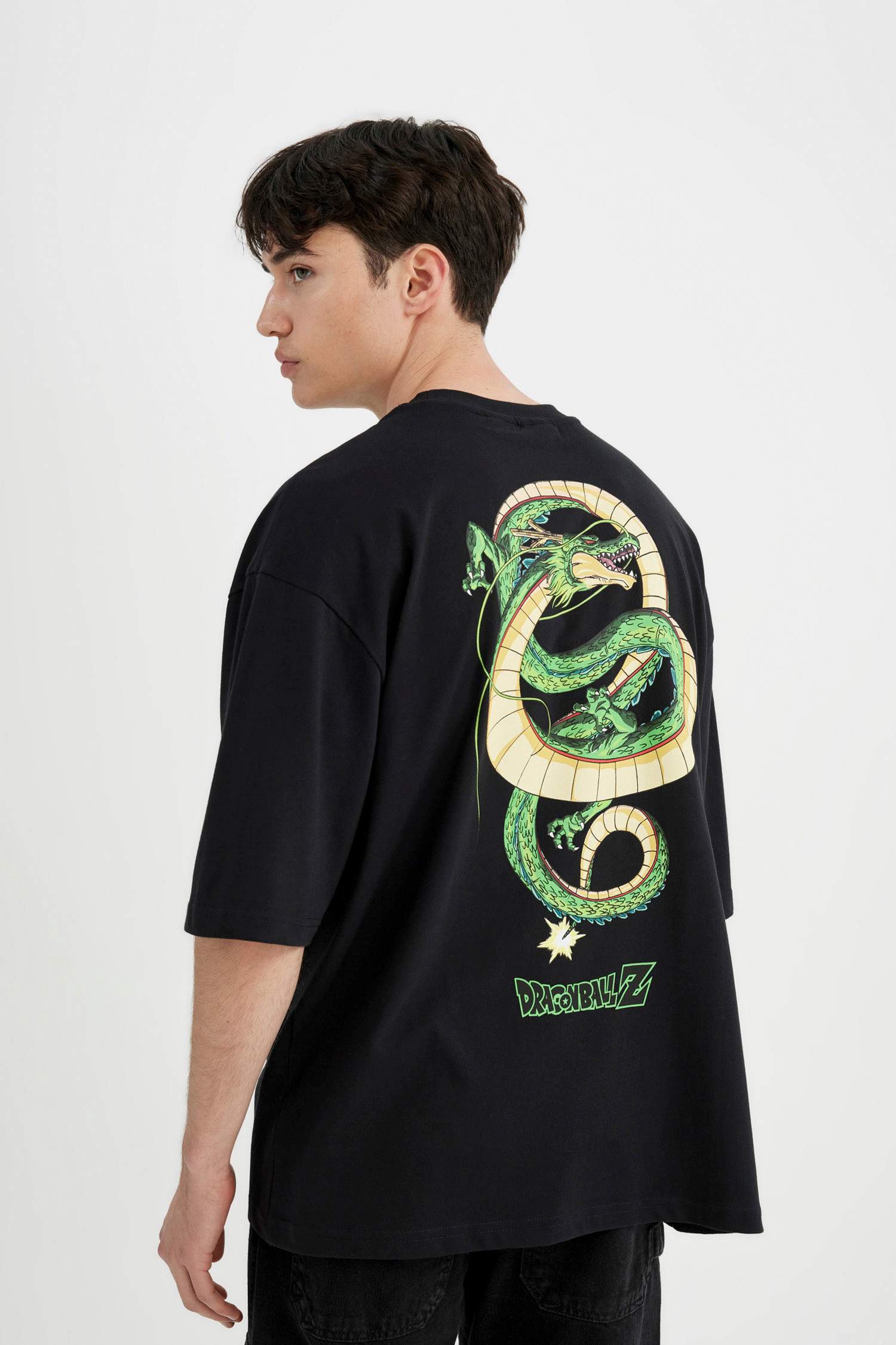 تيشيرت جيرسي مطبوع قصة فضفاضة بياخة مستديرة