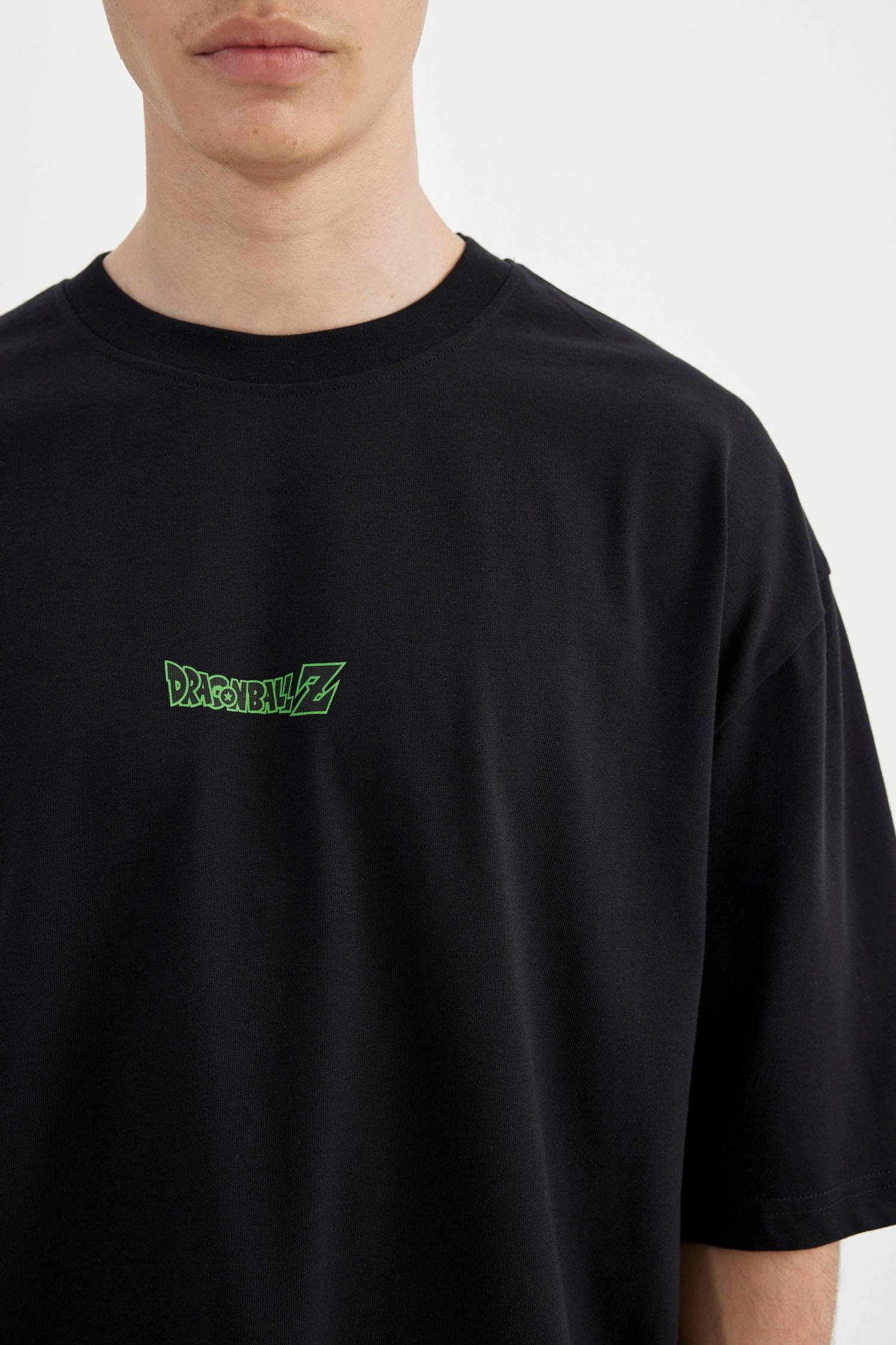 تيشيرت جيرسي مطبوع قصة فضفاضة بياخة مستديرة