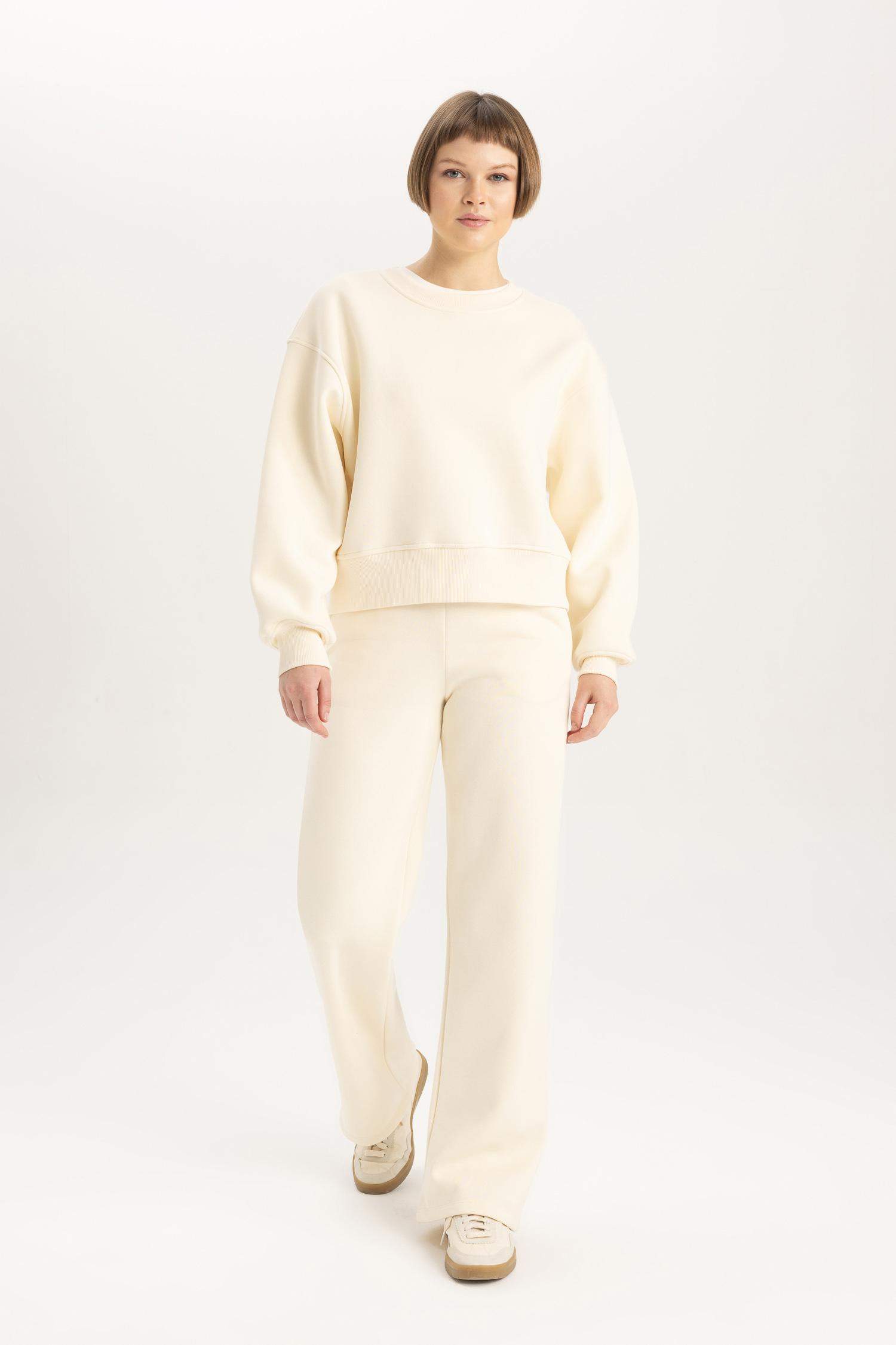 سويت شيرت قصة مريحة بياخة مستديرة