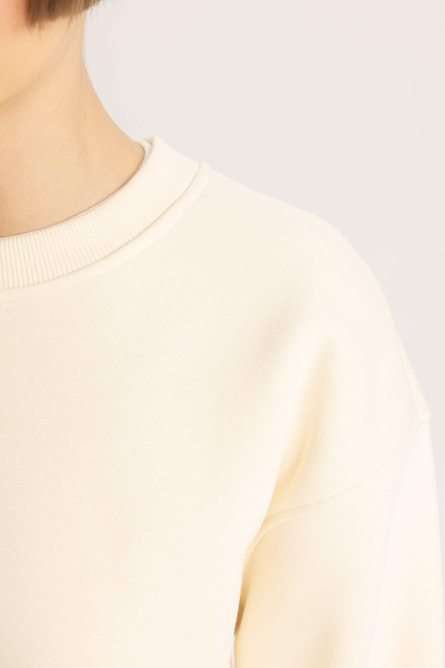 سويت شيرت قصة مريحة بياخة مستديرة