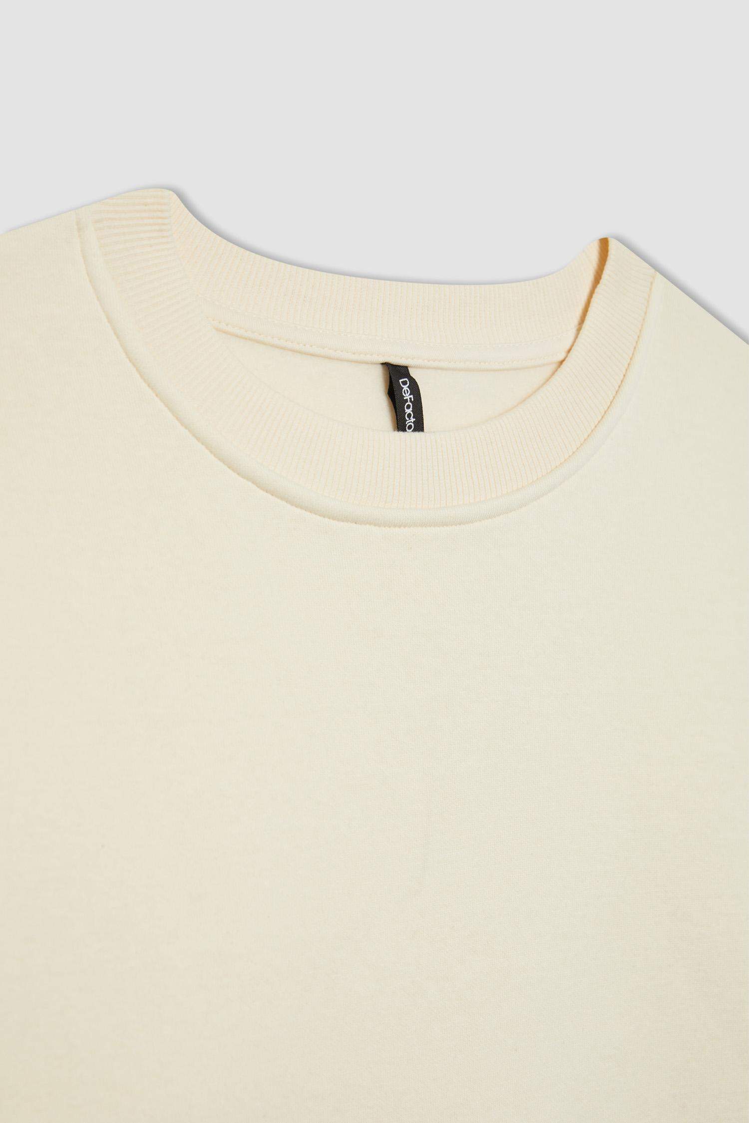 سويت شيرت قصة مريحة بياخة مستديرة