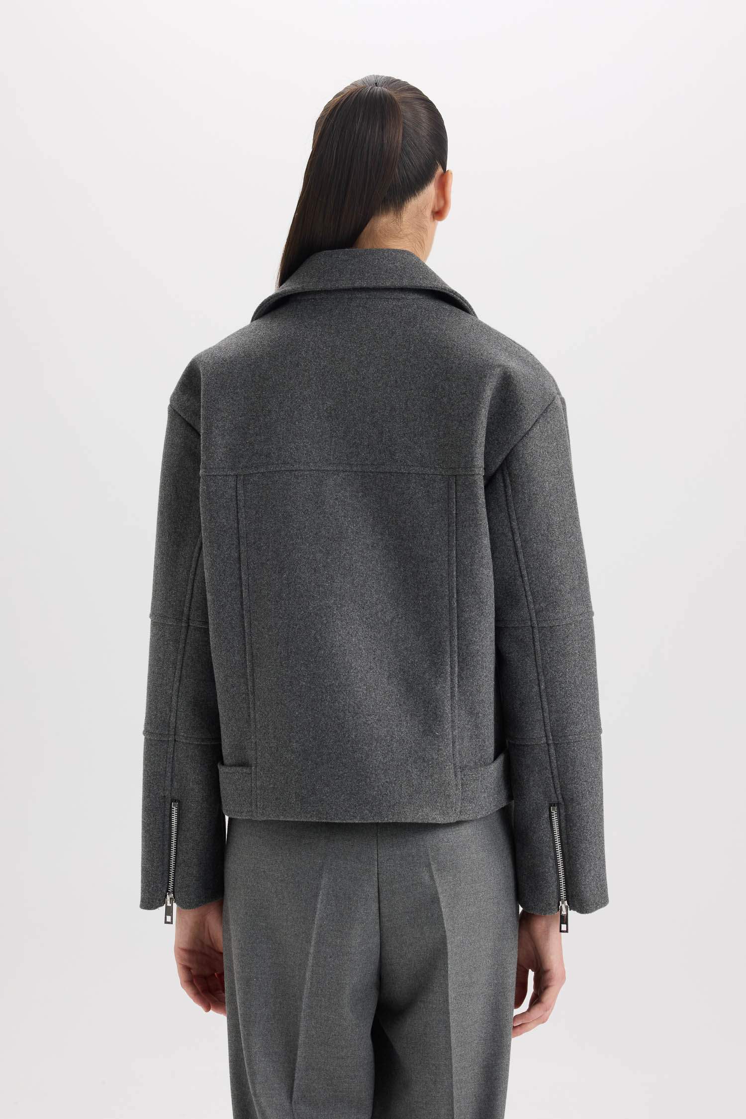 Veste en laine à fermeture zip avec poches et ceinture