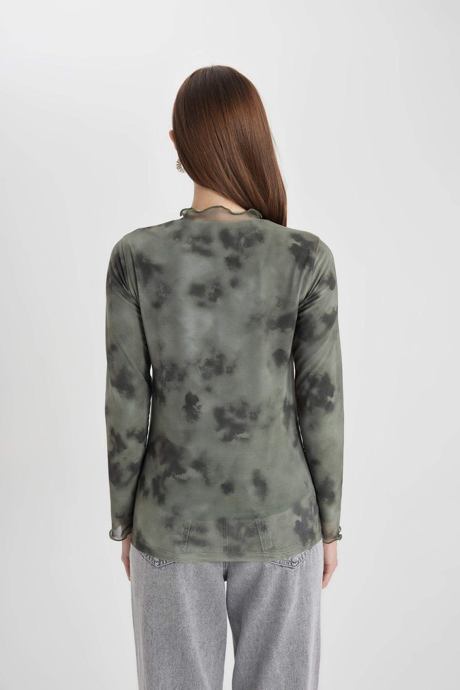 Tunique avec motifs à manches longues et col montant semi-montant