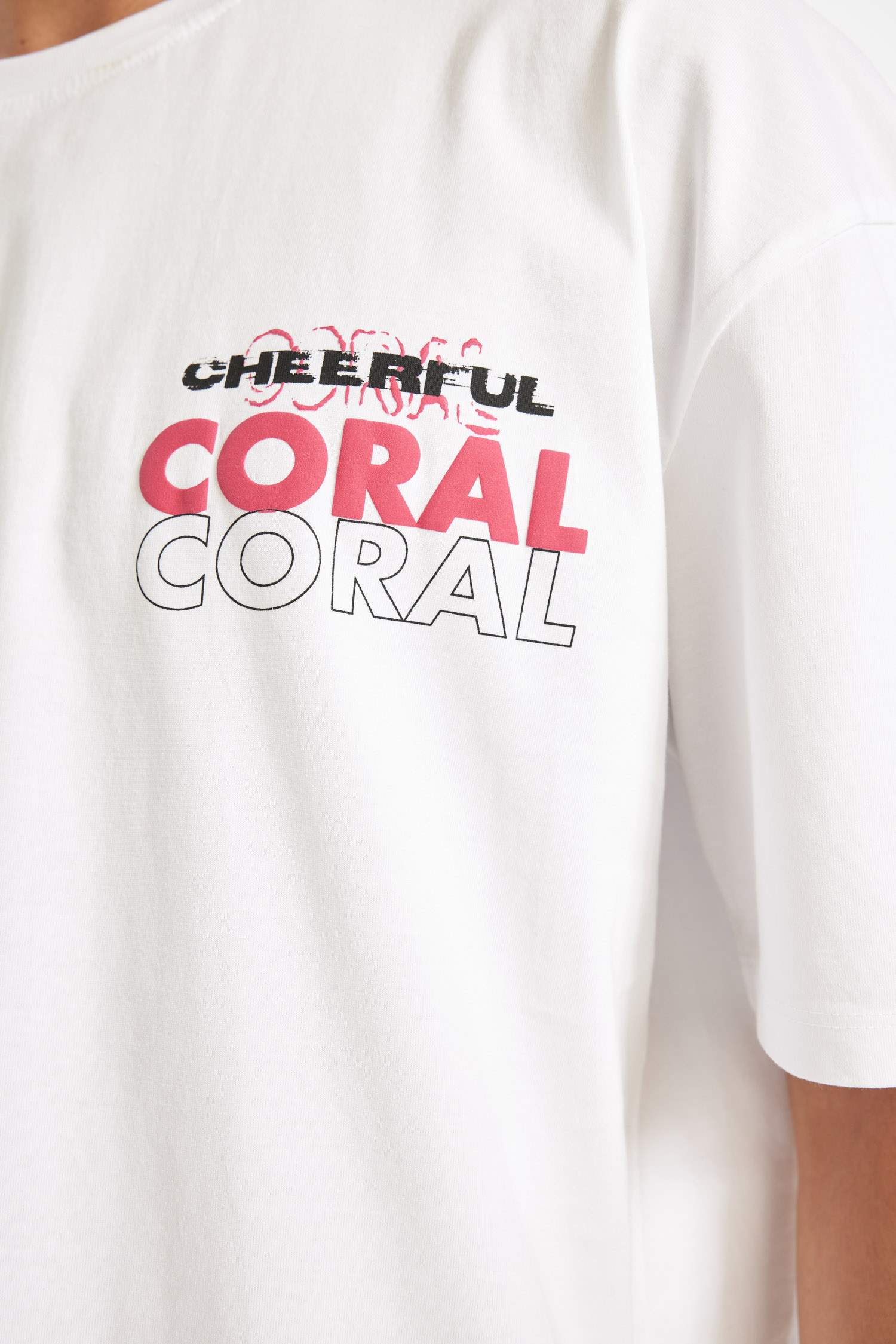 تيشيرت نص ردن اوفر سايز بطبعة من الخلف