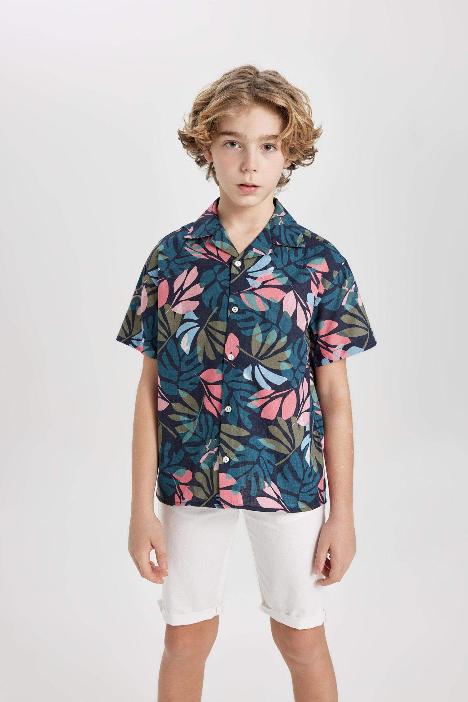 قميص بولو اولادي نص كم ذو مظهر كتاني اوفر سايز