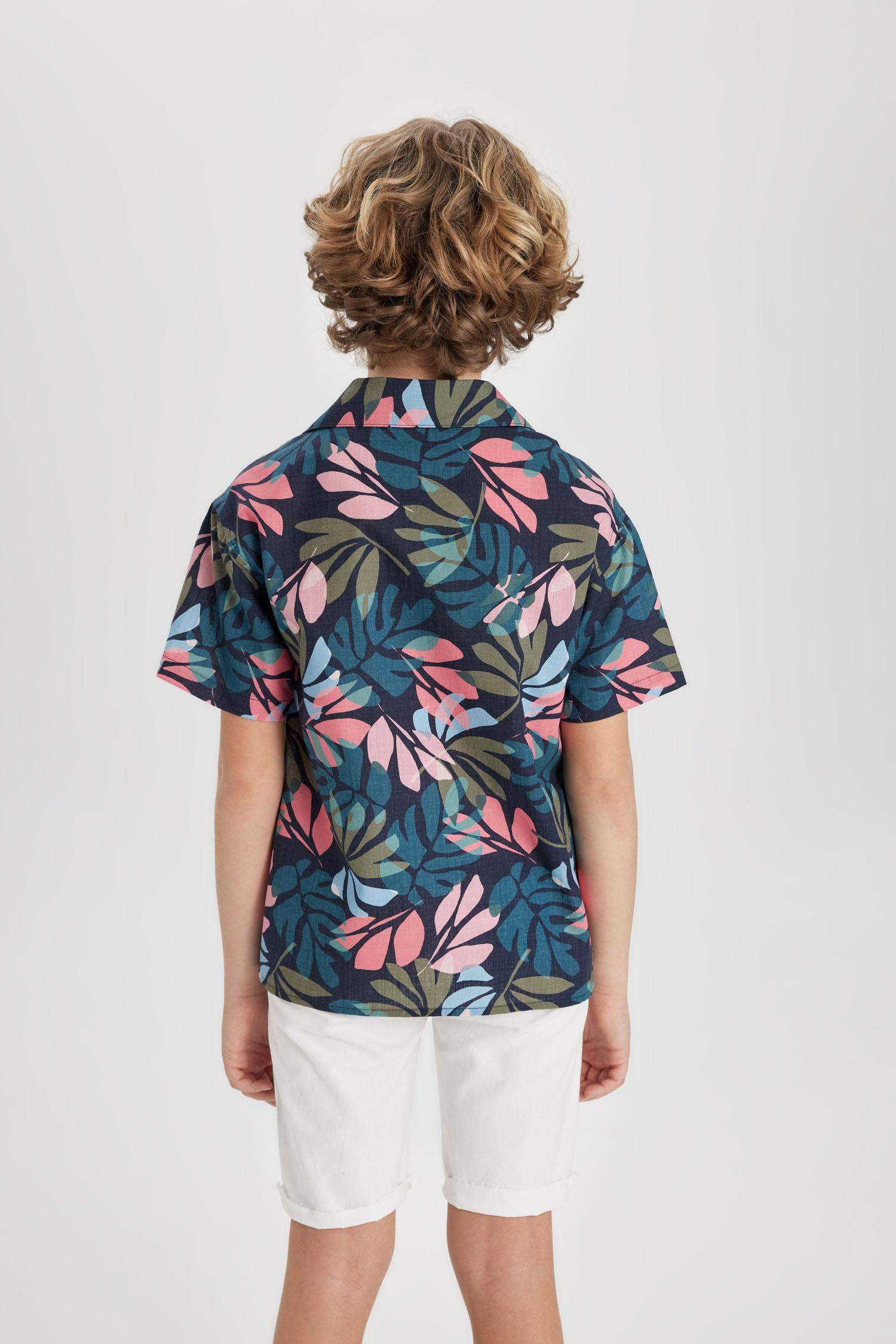 قميص بولو اولادي نص كم ذو مظهر كتاني اوفر سايز