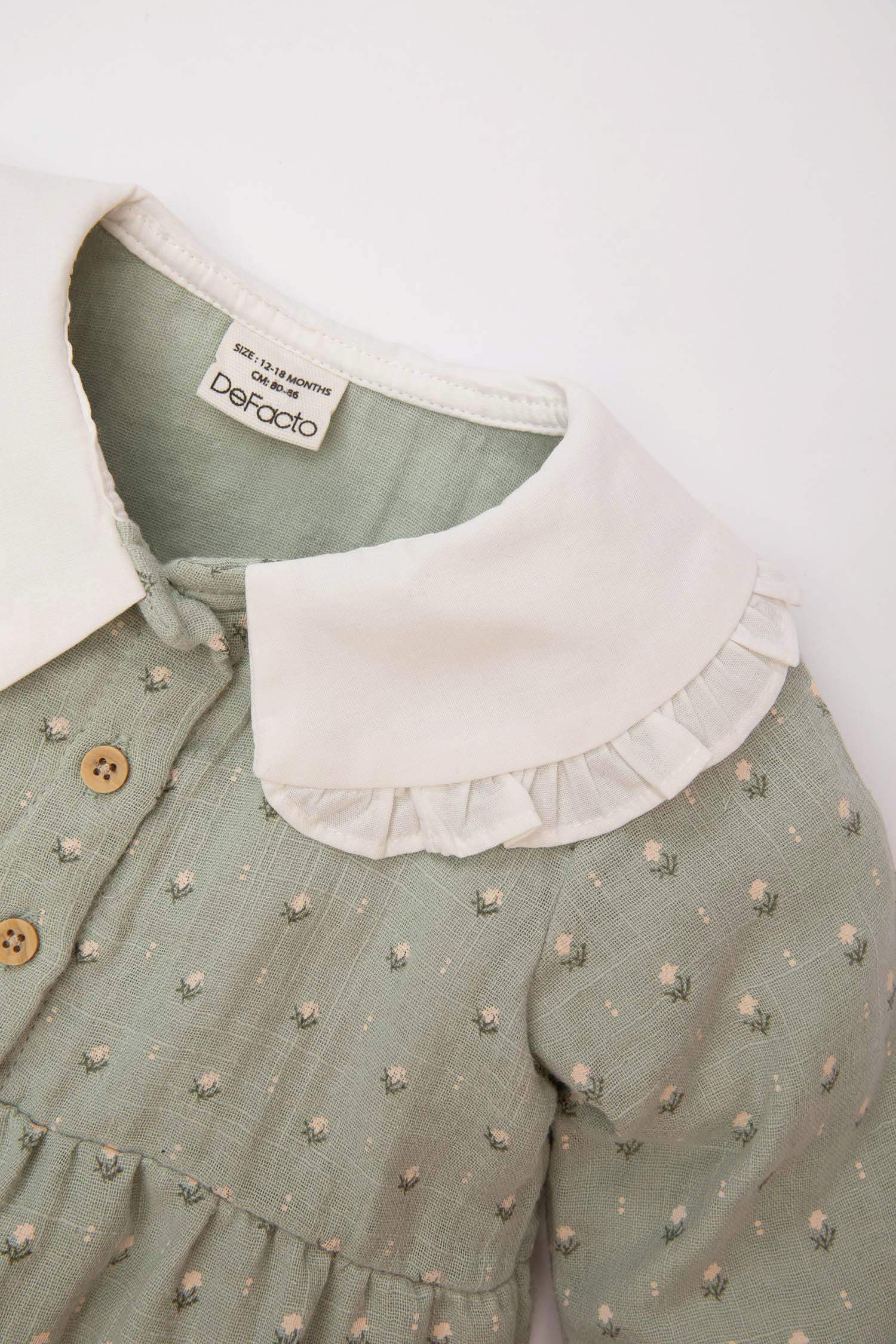 طقم بيبي بناتي حديثي الولادة جمبسوت فلورال وشرابات - قطعتين