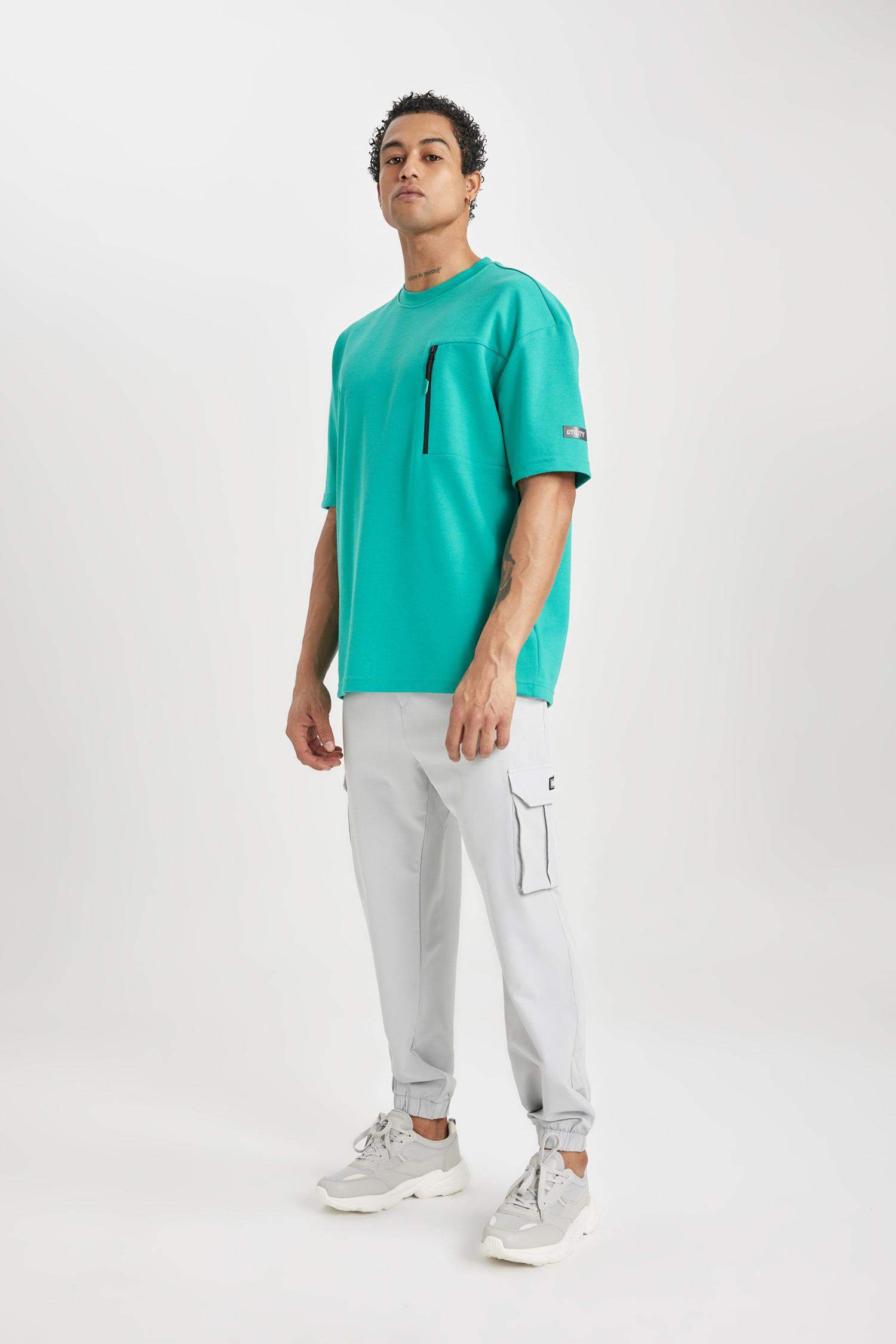 DeFactoFit Sporcu Jogger Eşofman Altı Standart Fit Kargo Cepli Dokuma Beli Paçası Lastikli