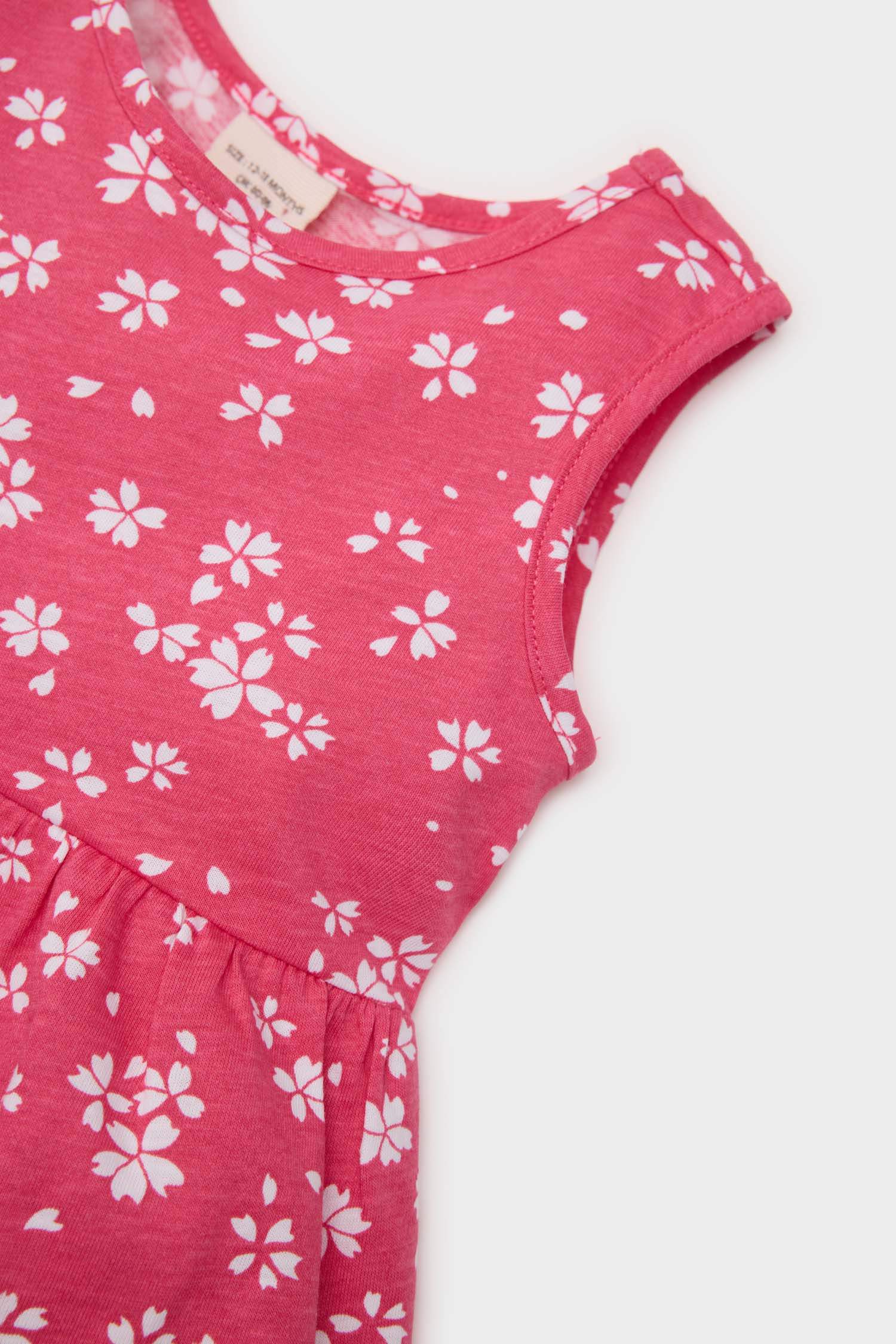Robe fleurie sans manches pour bébé fille