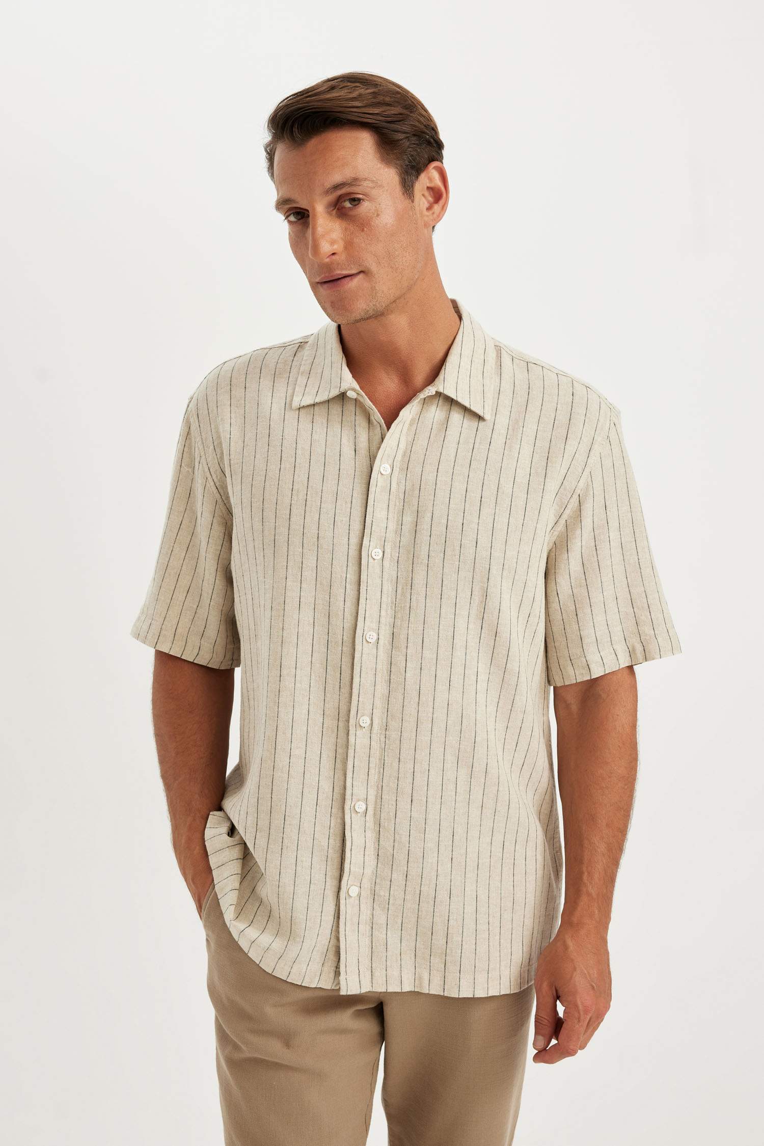 قميص بولو كتان مخطط قصة مريحة