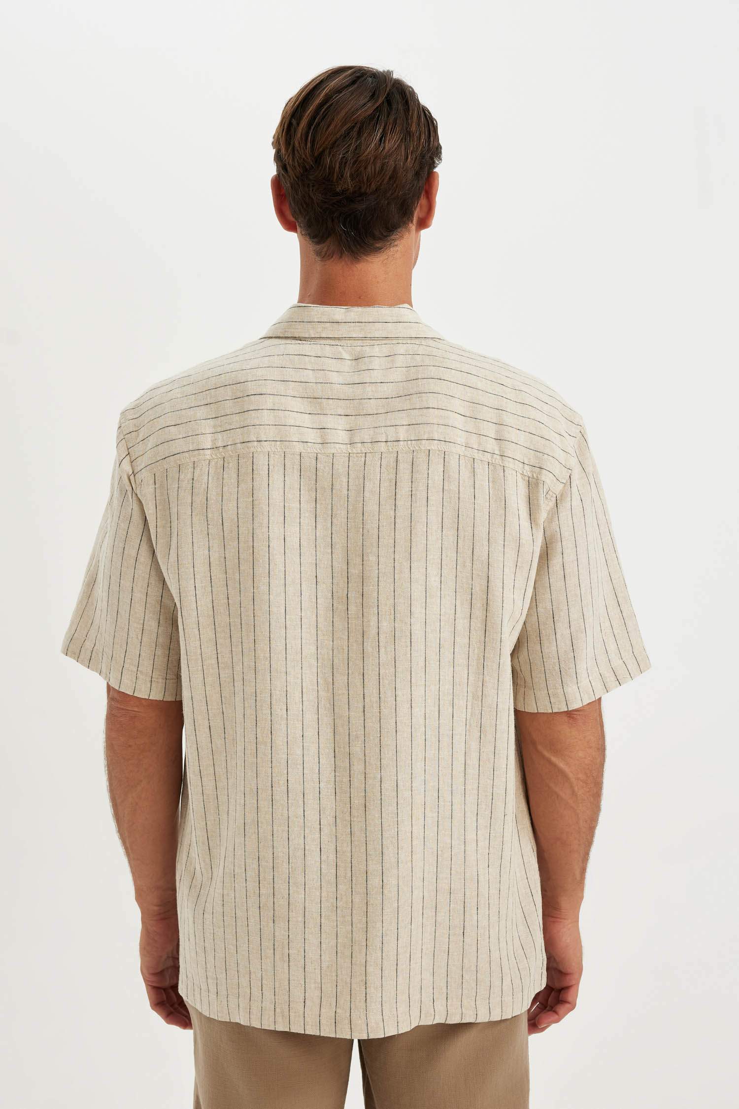 قميص بولو كتان مخطط قصة مريحة