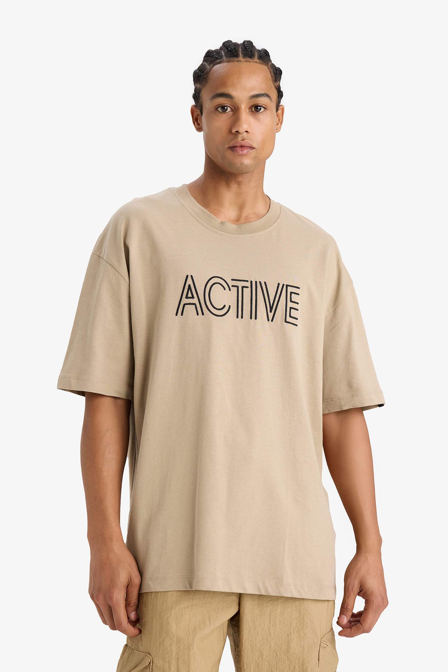 تي شيرت اوفر سايز مطرز بياخة مستديرة من DeFactoFit