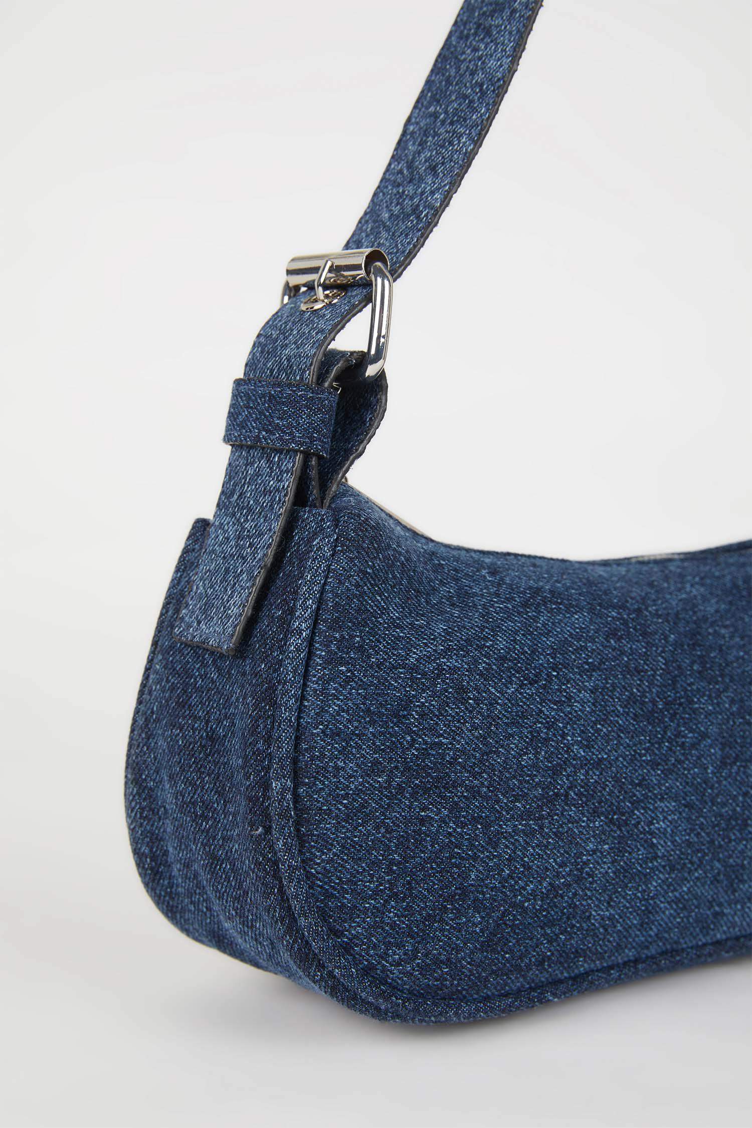 شنطة كتف حريمي جينز أزرق