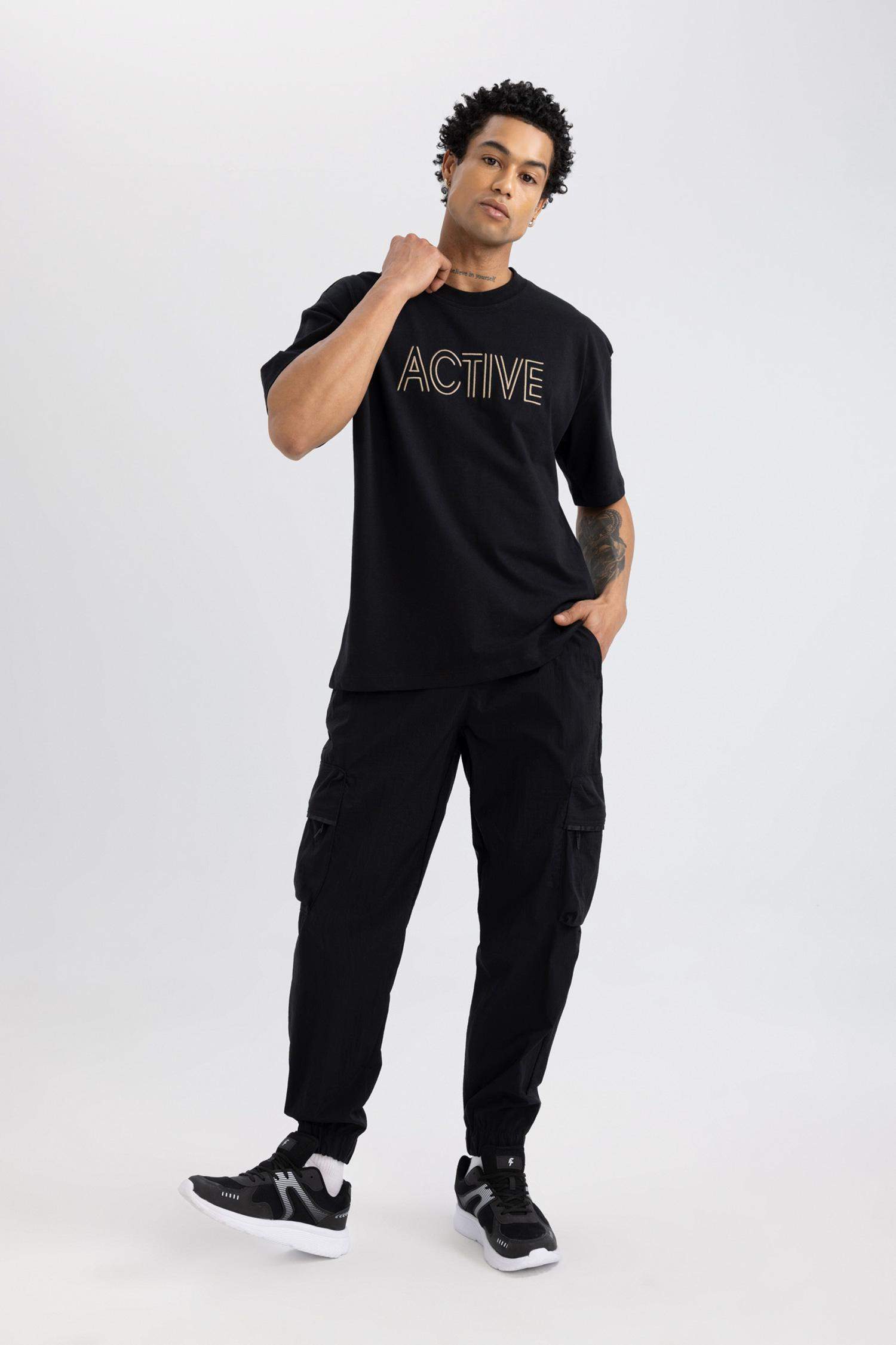 Oversize Geniş Kalıp Kargo Cepli Sporcu Dokuma Pantolon