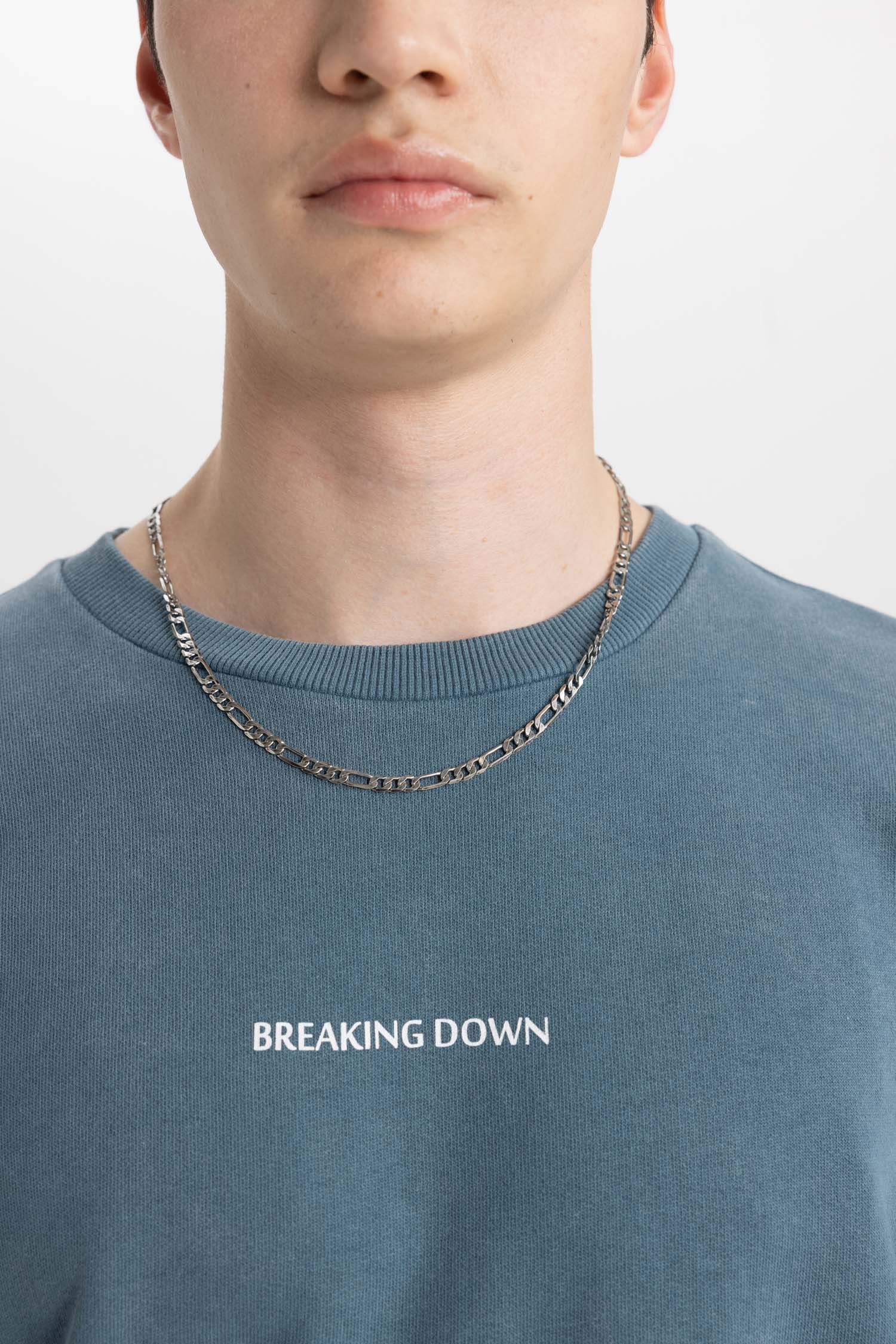 سويت شيرت فلورال قصة مريحة بياخة مستديرة