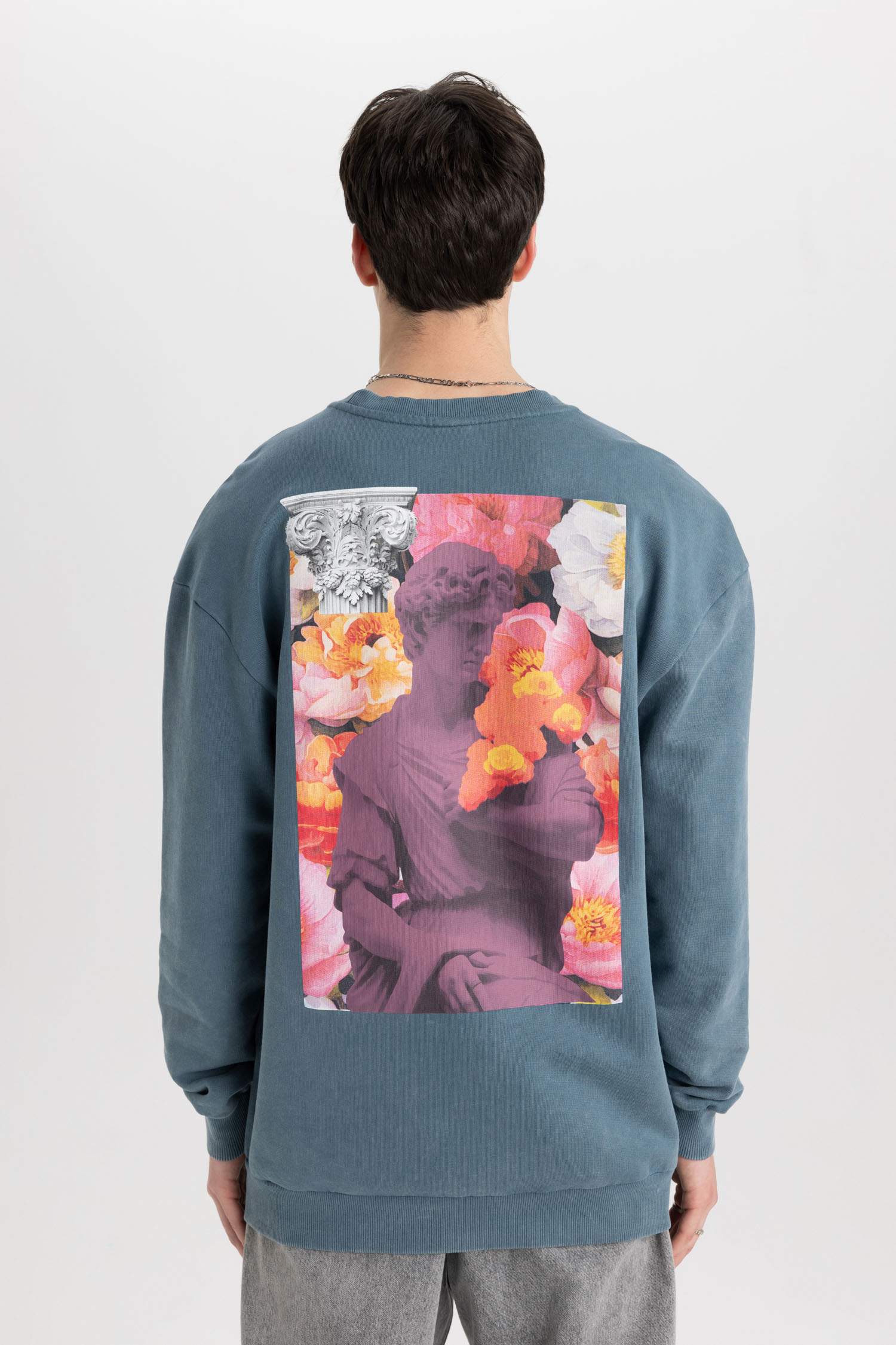 سويت شيرت فلورال قصة مريحة بياخة مستديرة