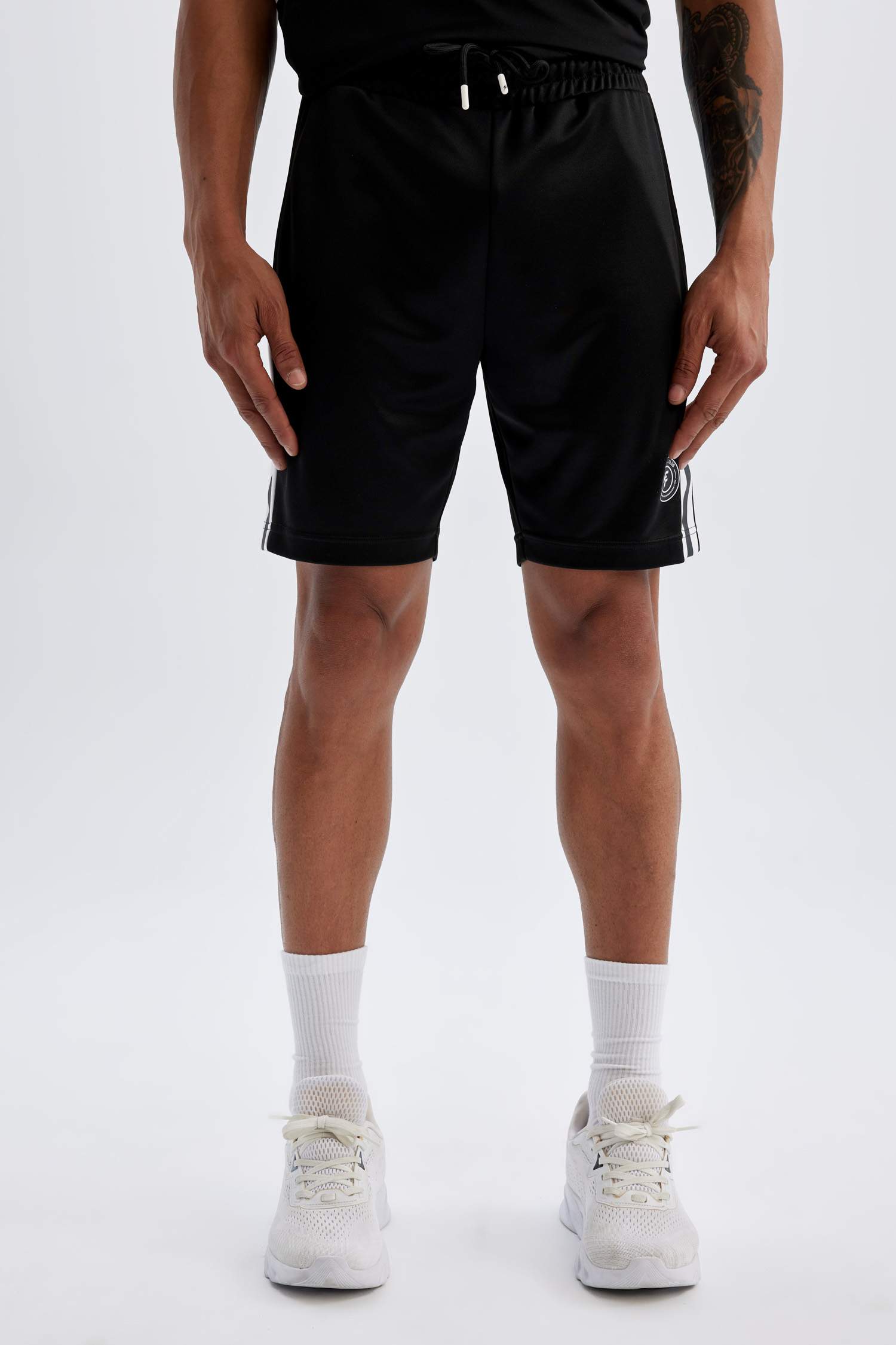 شورت رياضي قصير قصة عادية من DeFactoFit