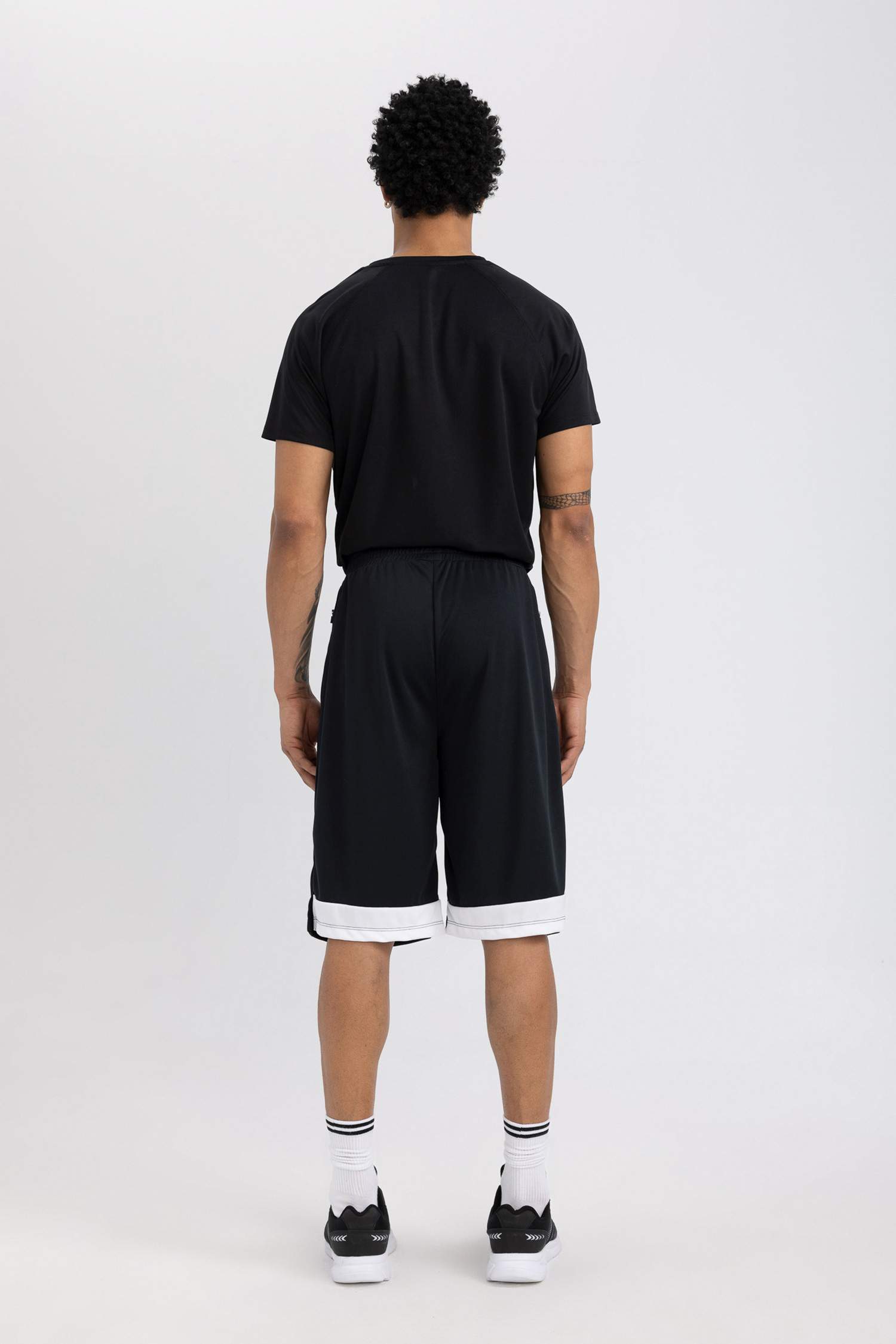 شورت بريميوم أسود قصة عادية من DeFactoFit