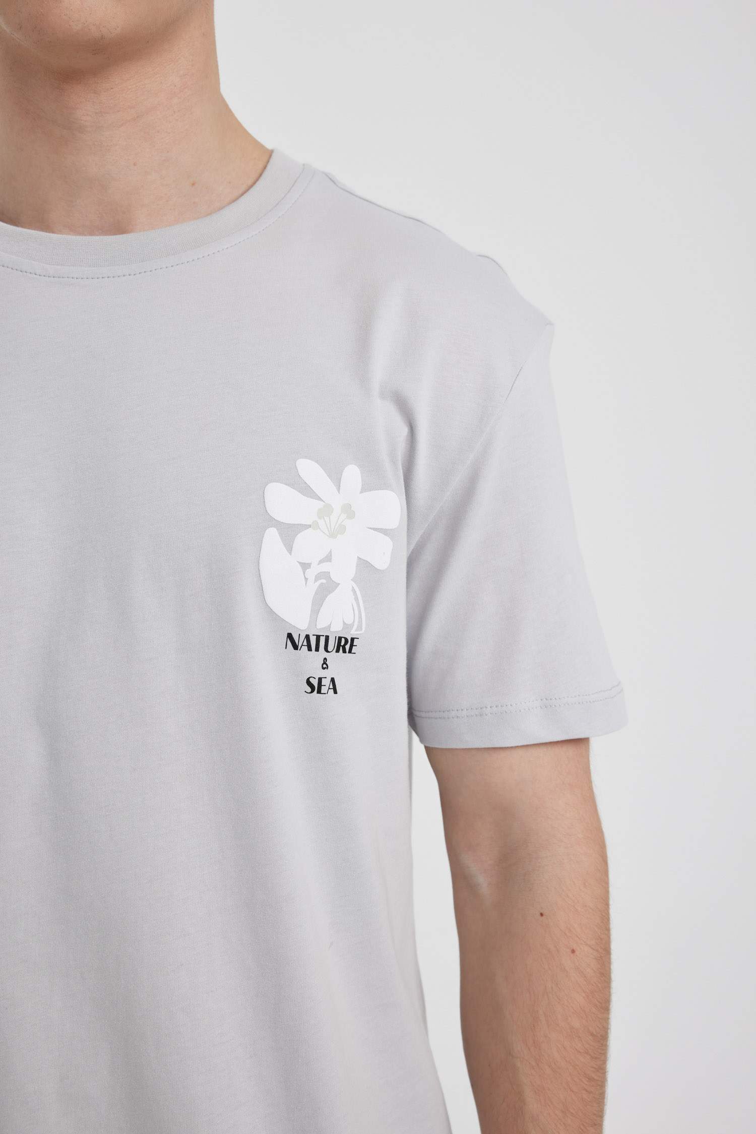 تي شيرت جيرسي قصة عادية بياخة مستديرة