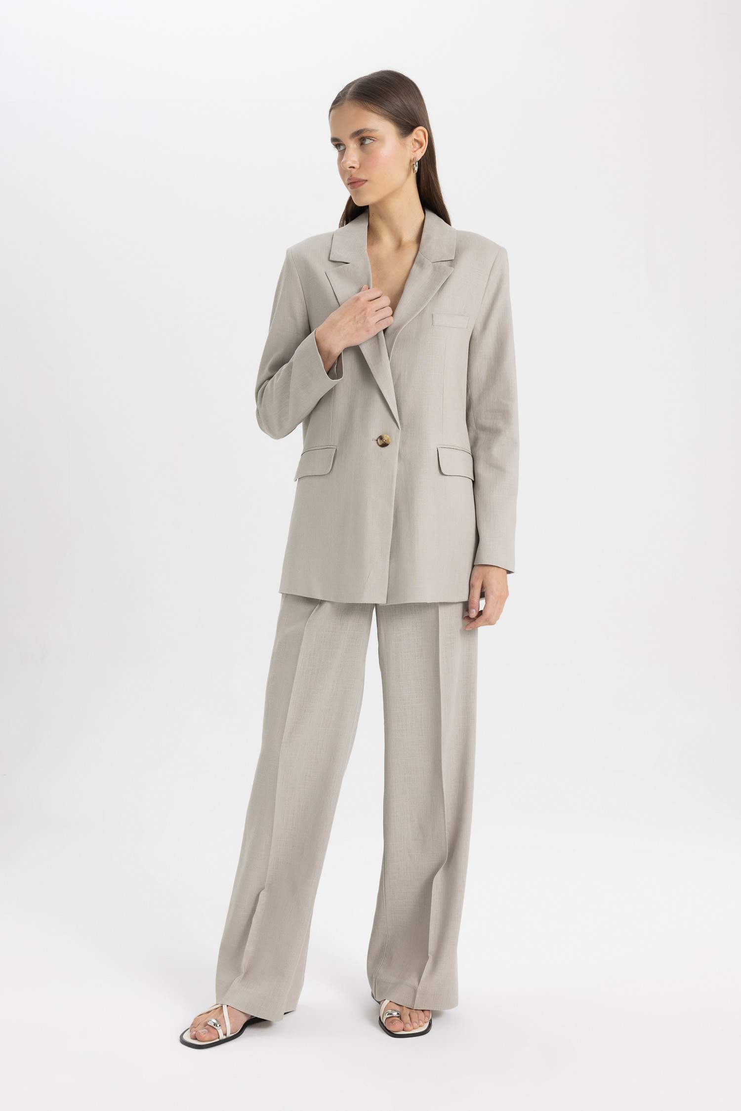 جاكيت بليزر اوفر سايز مخطط ممزوج بالكتان