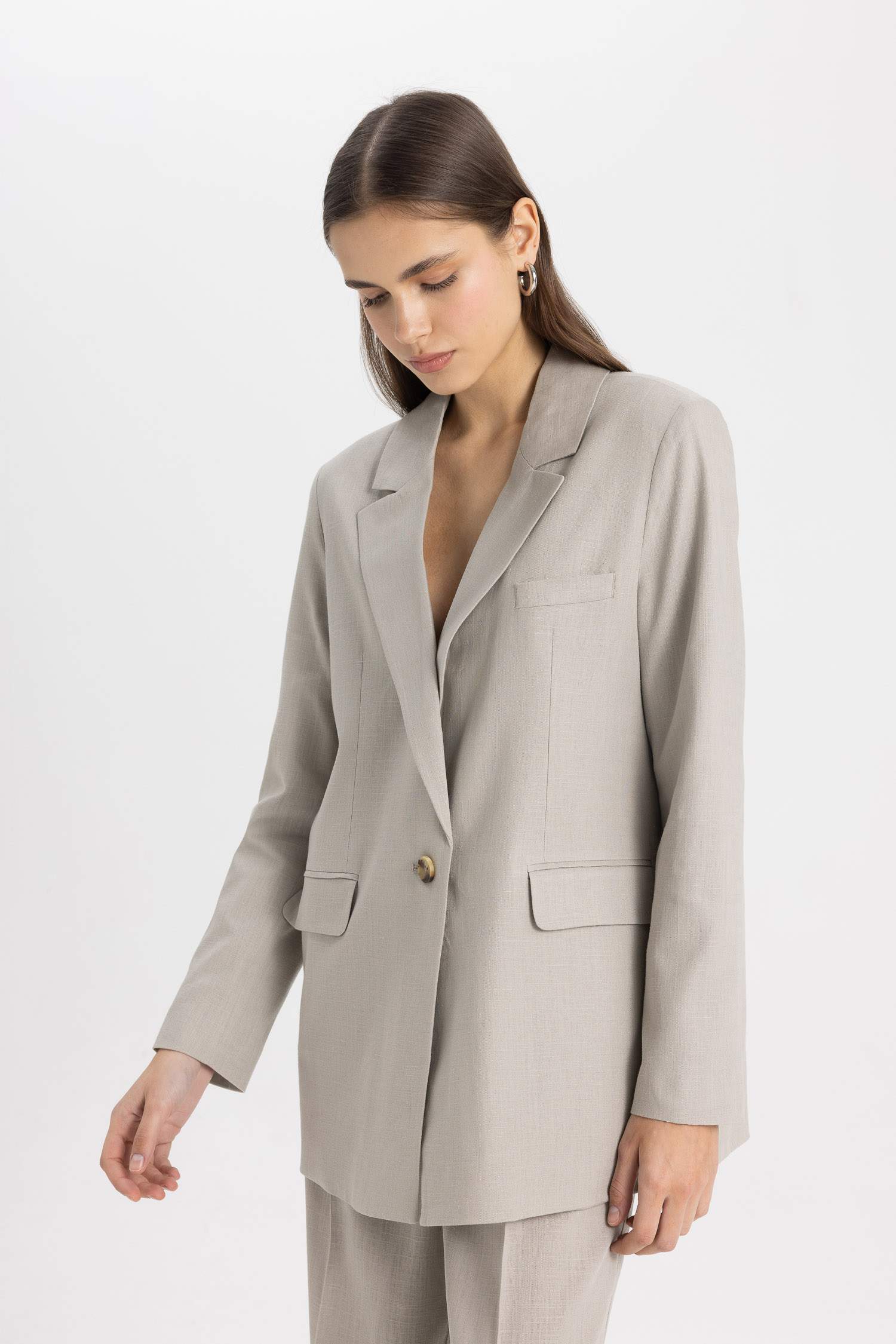 جاكيت بليزر اوفر سايز مخطط ممزوج بالكتان