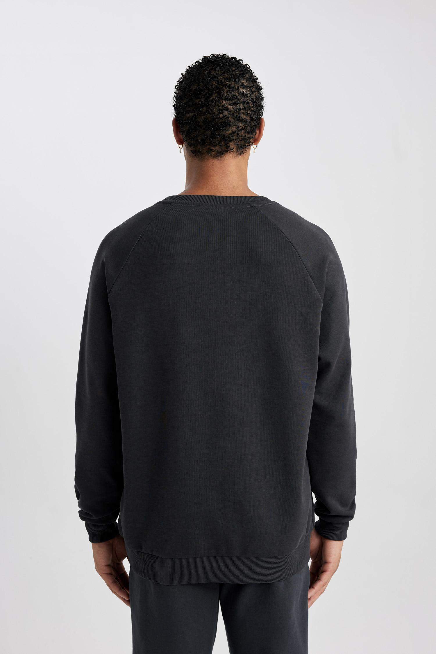 سويت شيرت قصة عادية من قماش سكوبا من DeFactoFit