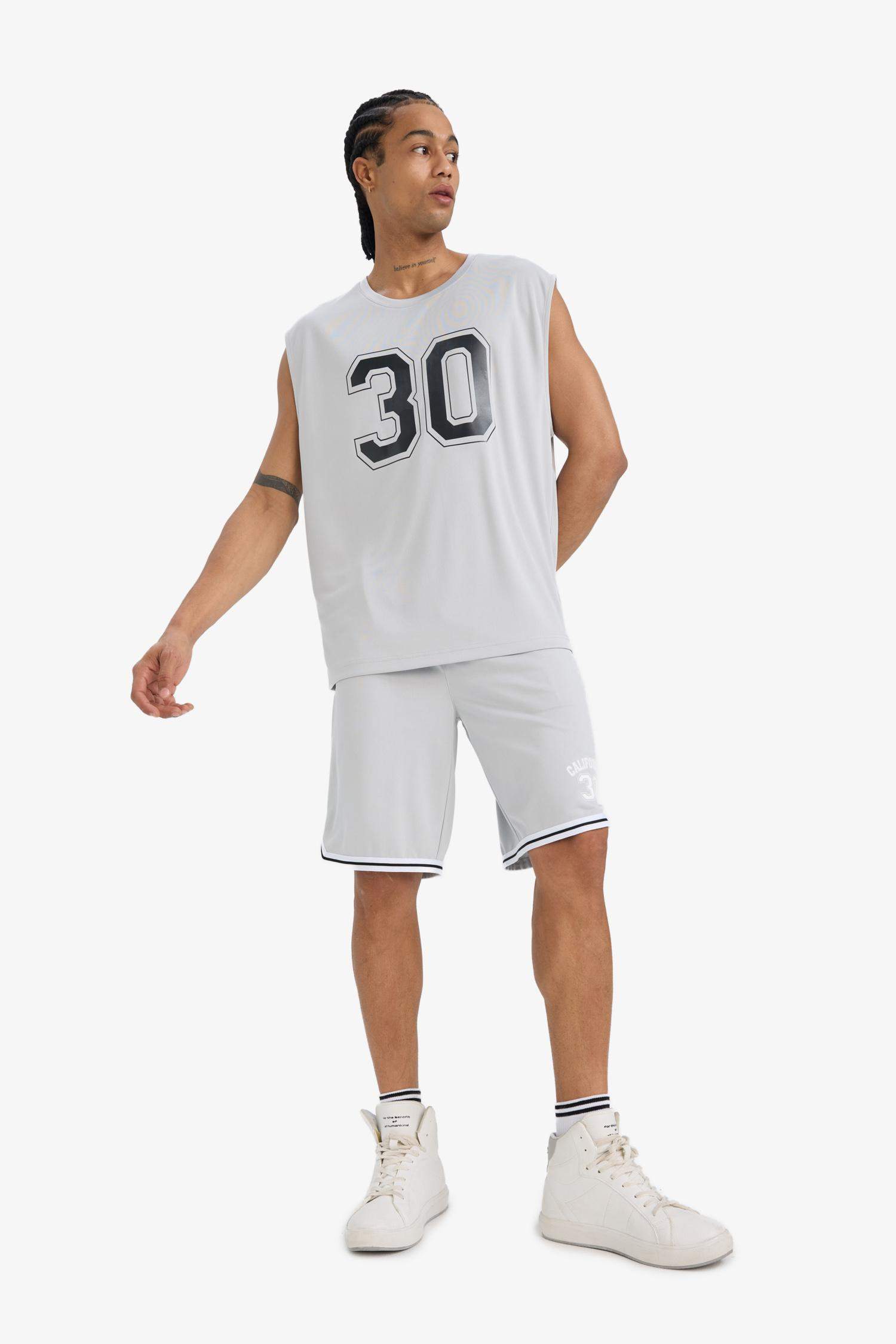 DeFactoFit Hızlı Kuruyan Standart Fit Sporcu Kısa Paça Şort