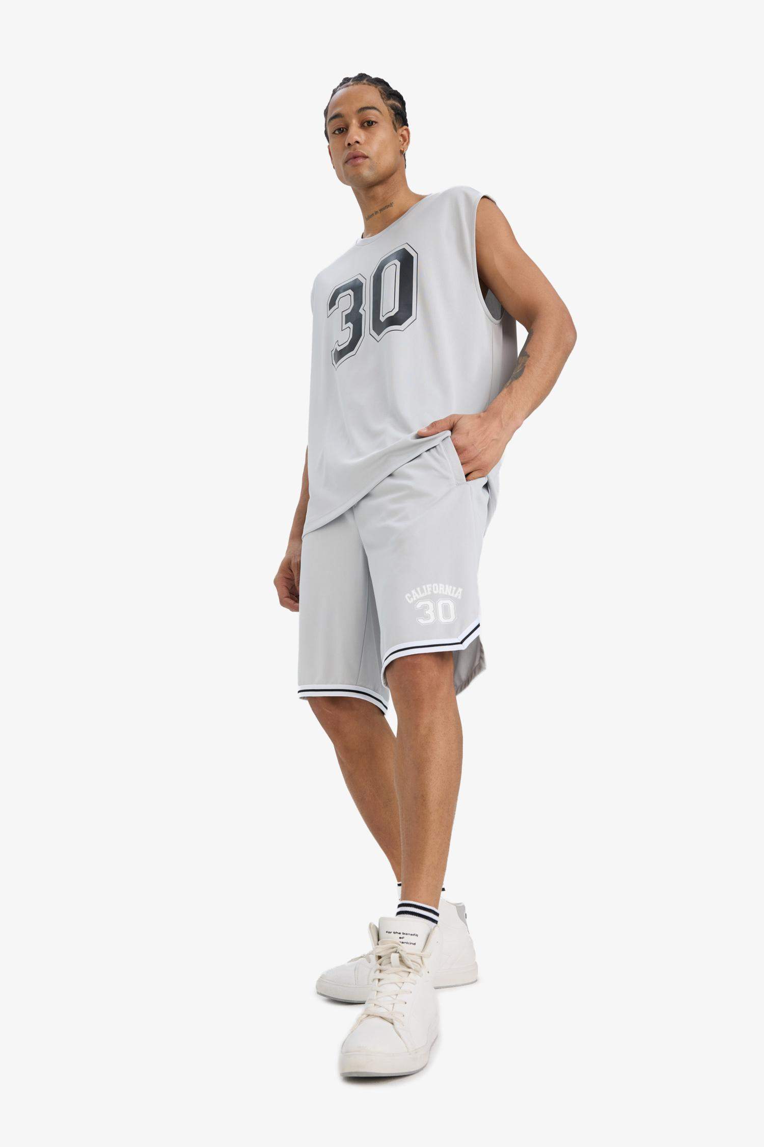 DeFactoFit Hızlı Kuruyan Standart Fit Sporcu Kısa Paça Şort