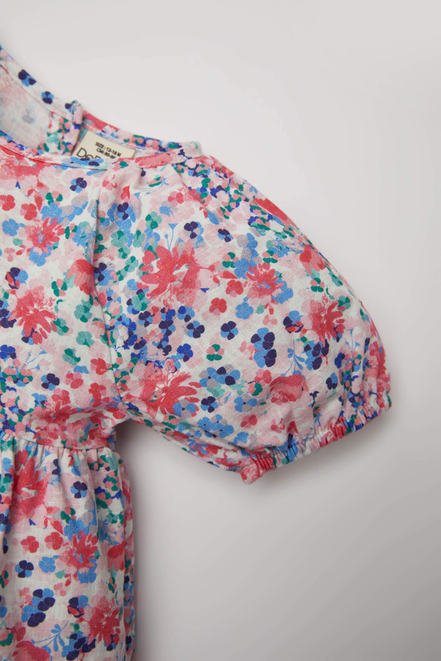 Robe manches courtes aspect lin imprimée pour bébé fille