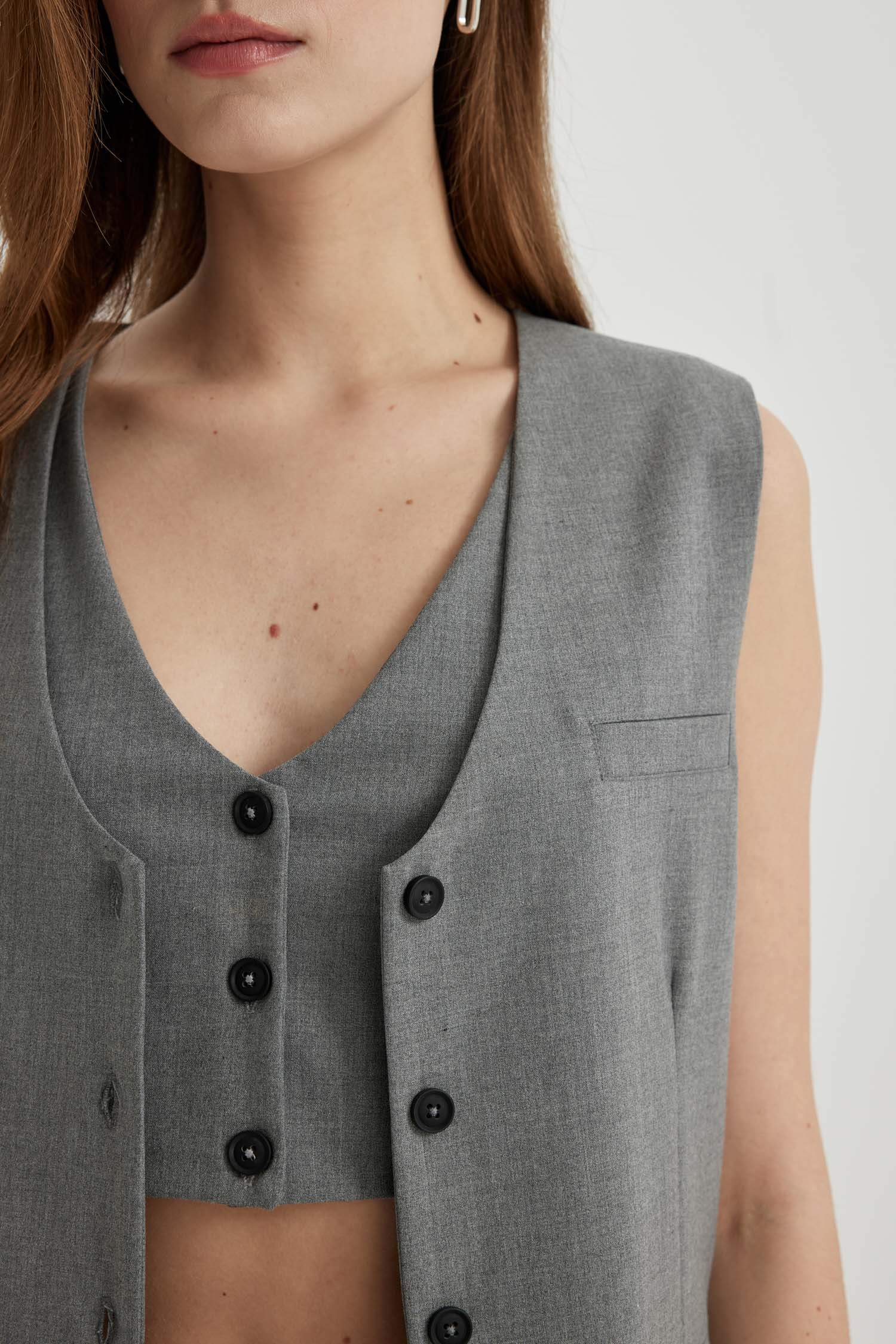 ұзын пішім v жаға Жилет