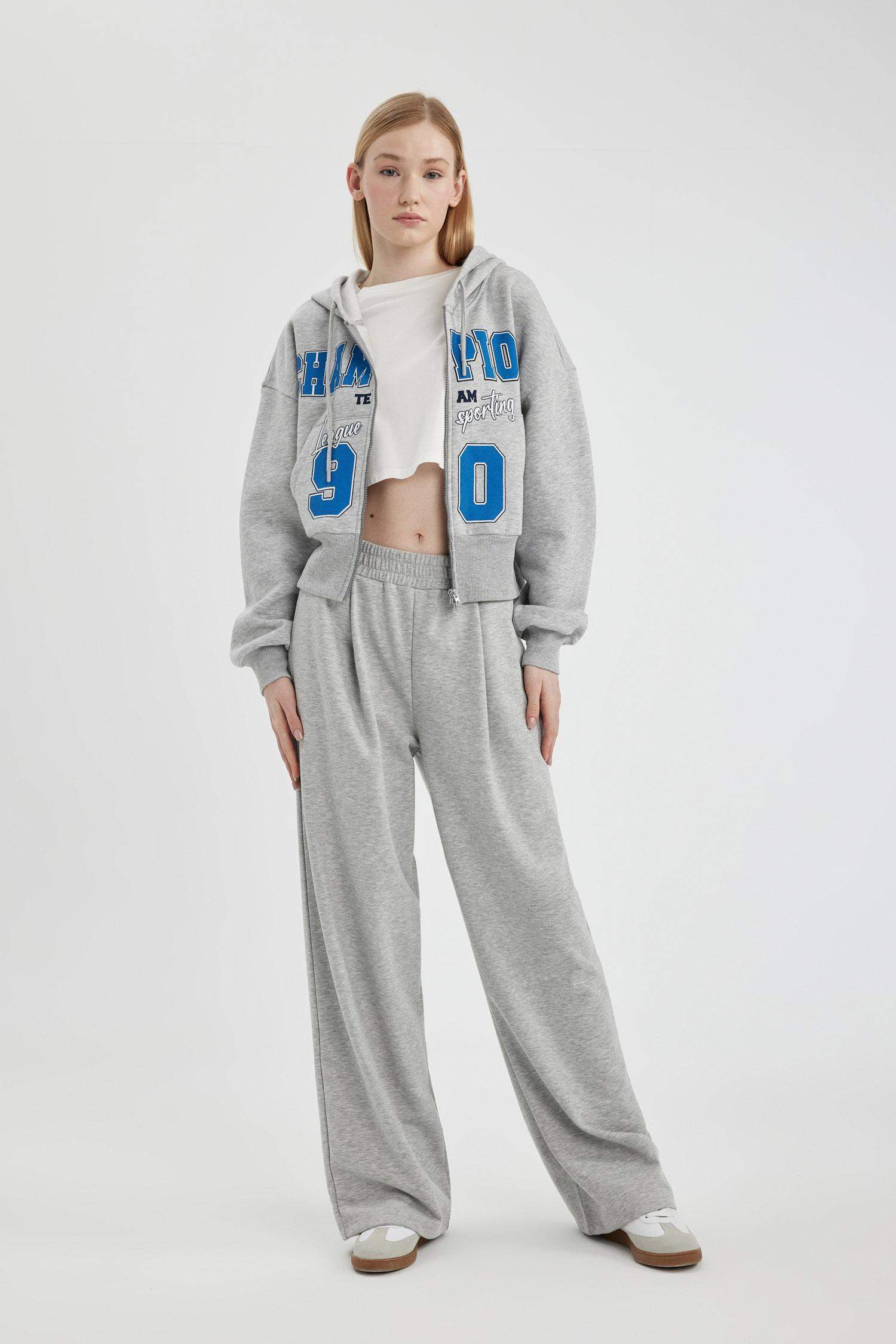 سويتر قماش سميك اوفر سايز بغطاء للرأس بجيب  بطبعة نجمة