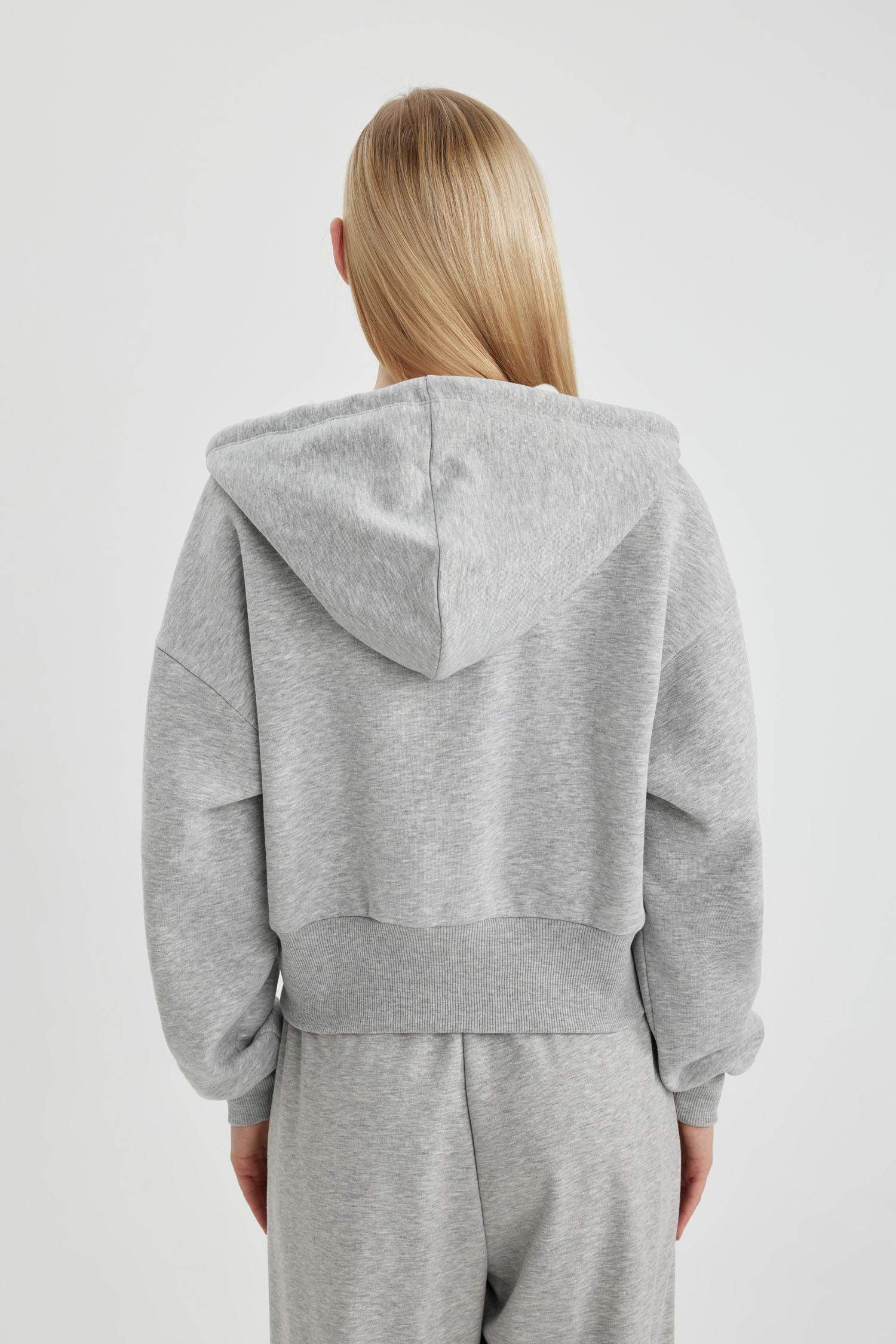 سويتر قماش سميك اوفر سايز بغطاء للرأس بجيب  بطبعة نجمة