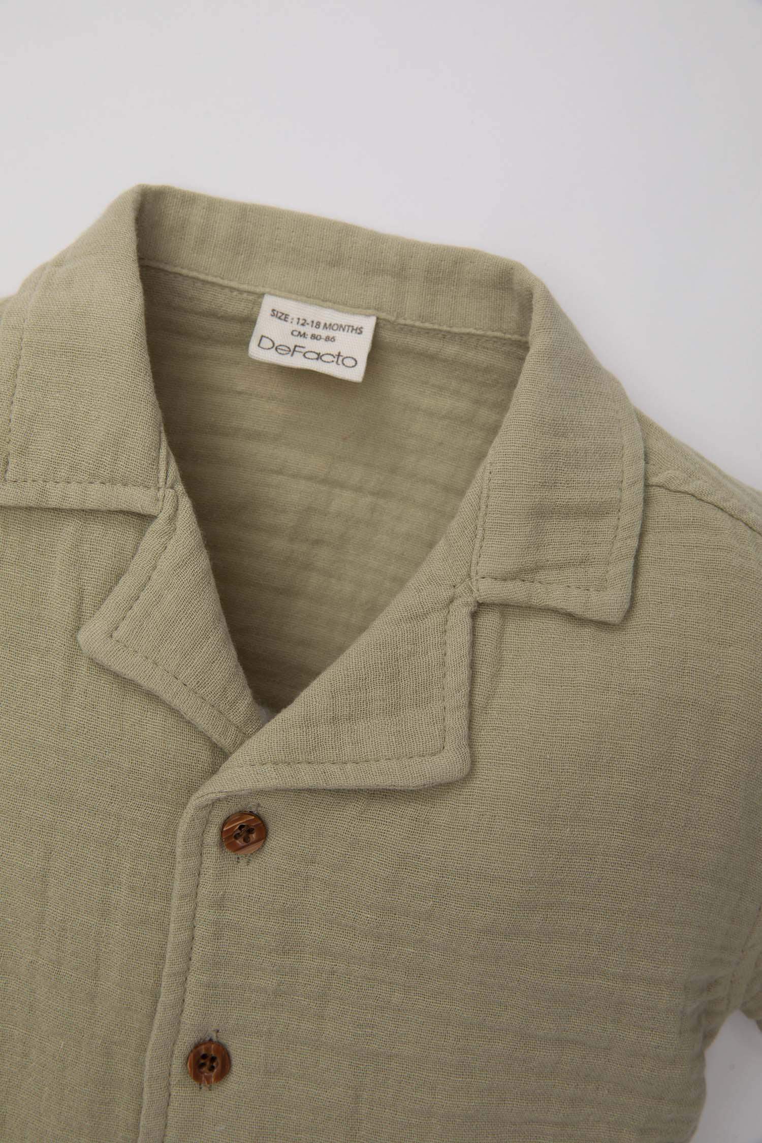 قميص ولادي نص كم موسلين قصة عادية وياقة عالية