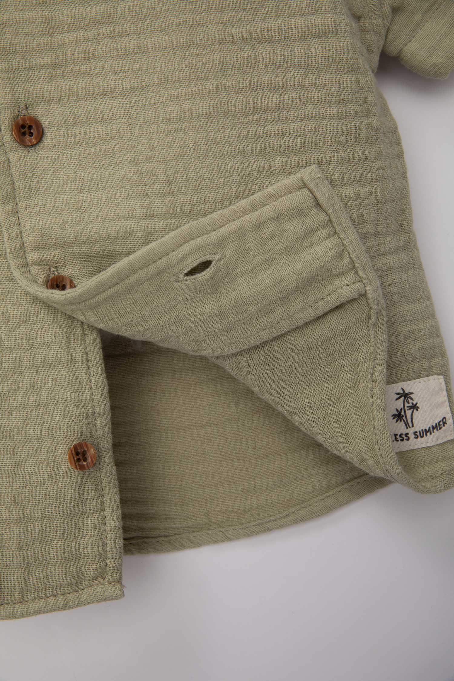 قميص ولادي نص كم موسلين قصة عادية وياقة عالية