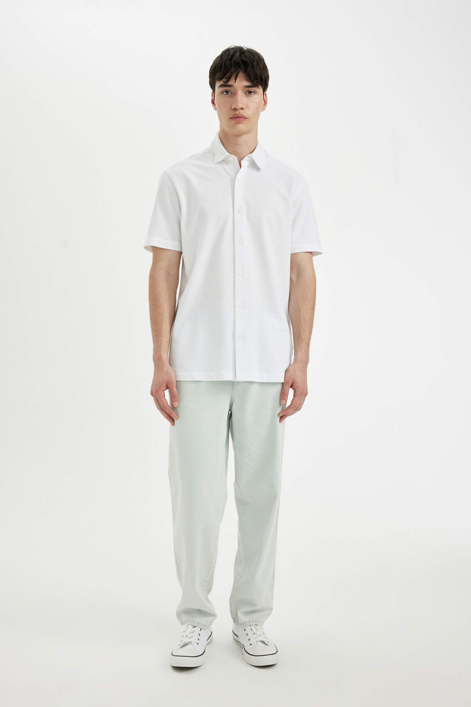 قميص نص كم محبوك قصة عادية