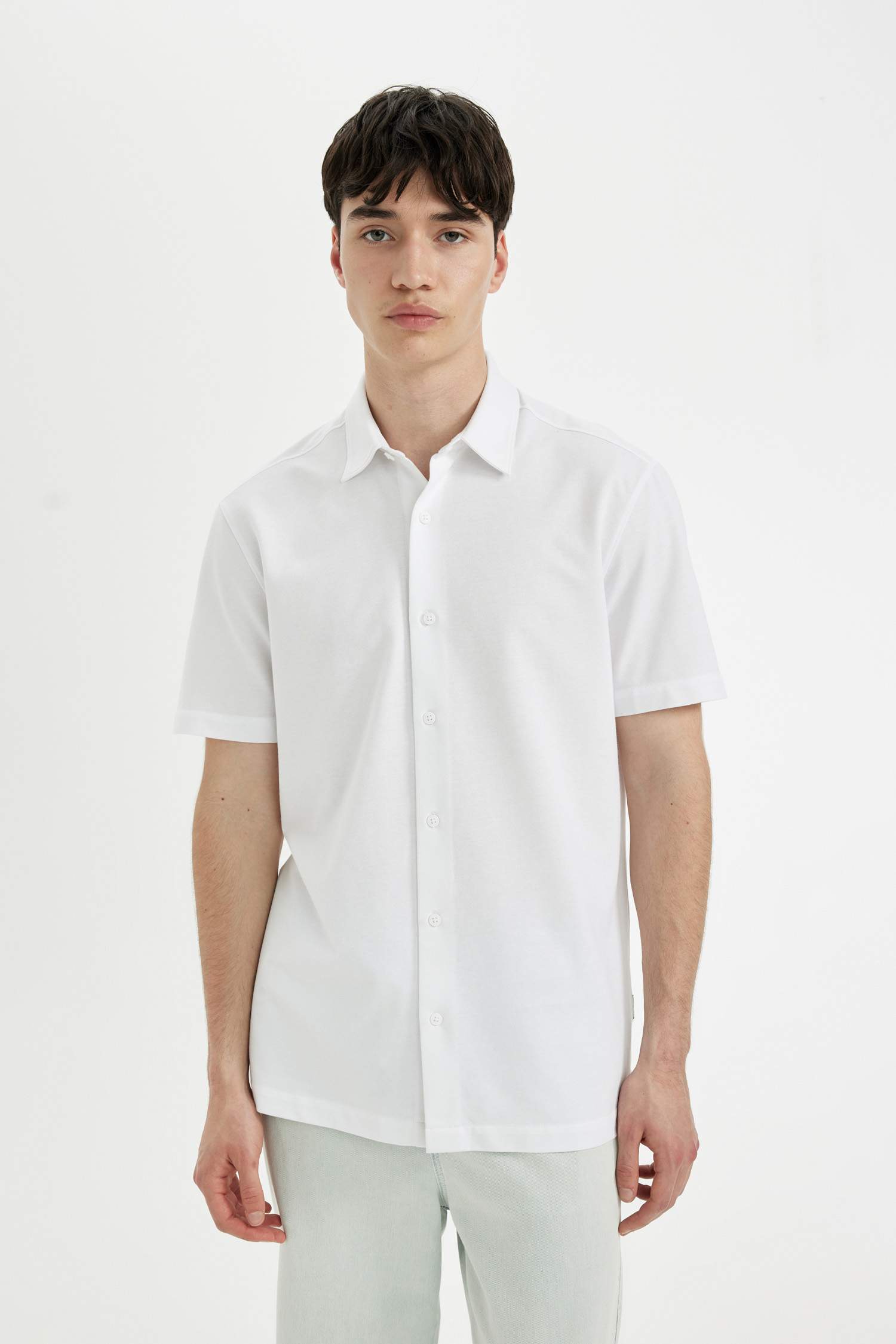 قميص نص كم محبوك قصة عادية