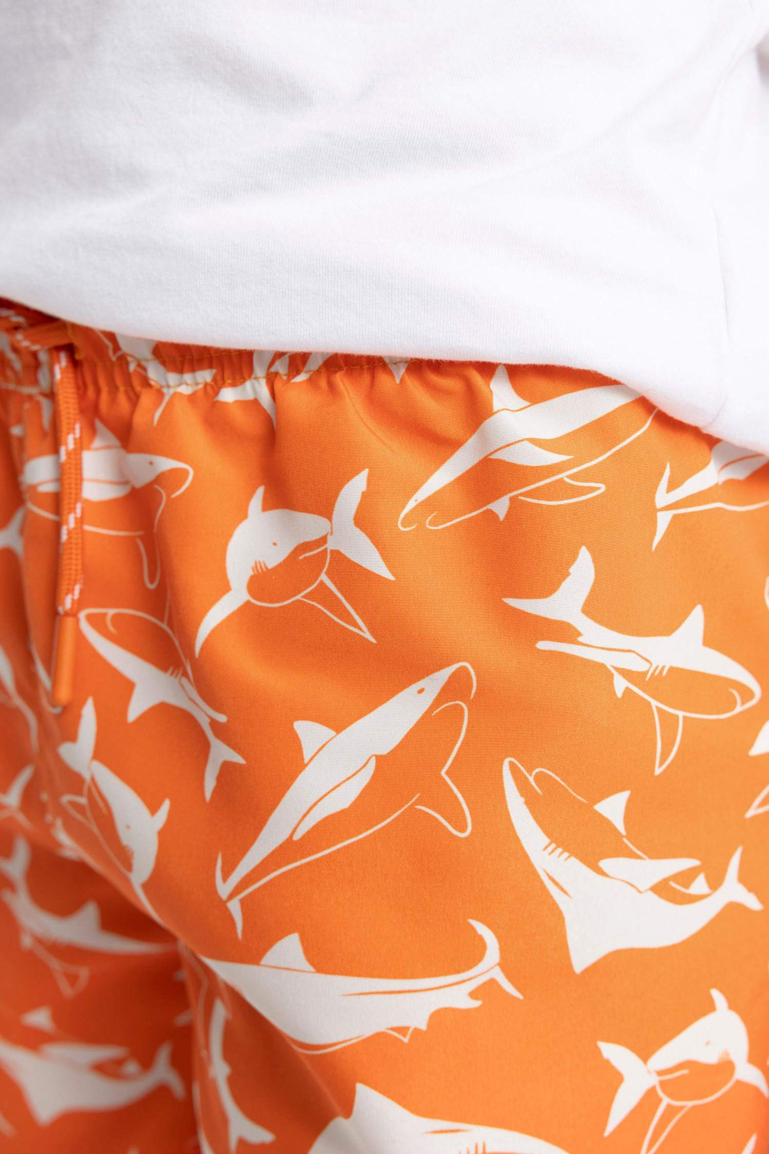 شورت بحر اولادي كحلي بطبعة سمك